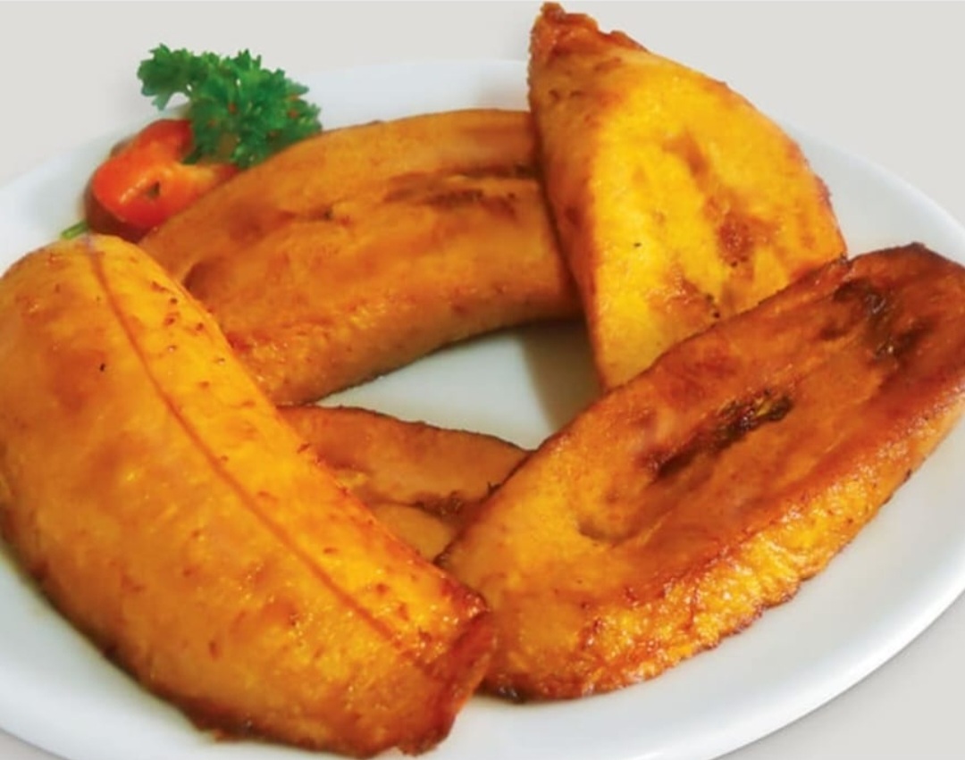 Order Maduros / Fried Sweet Plantains food online from Mr. Mario store, College Point on bringmethat.com