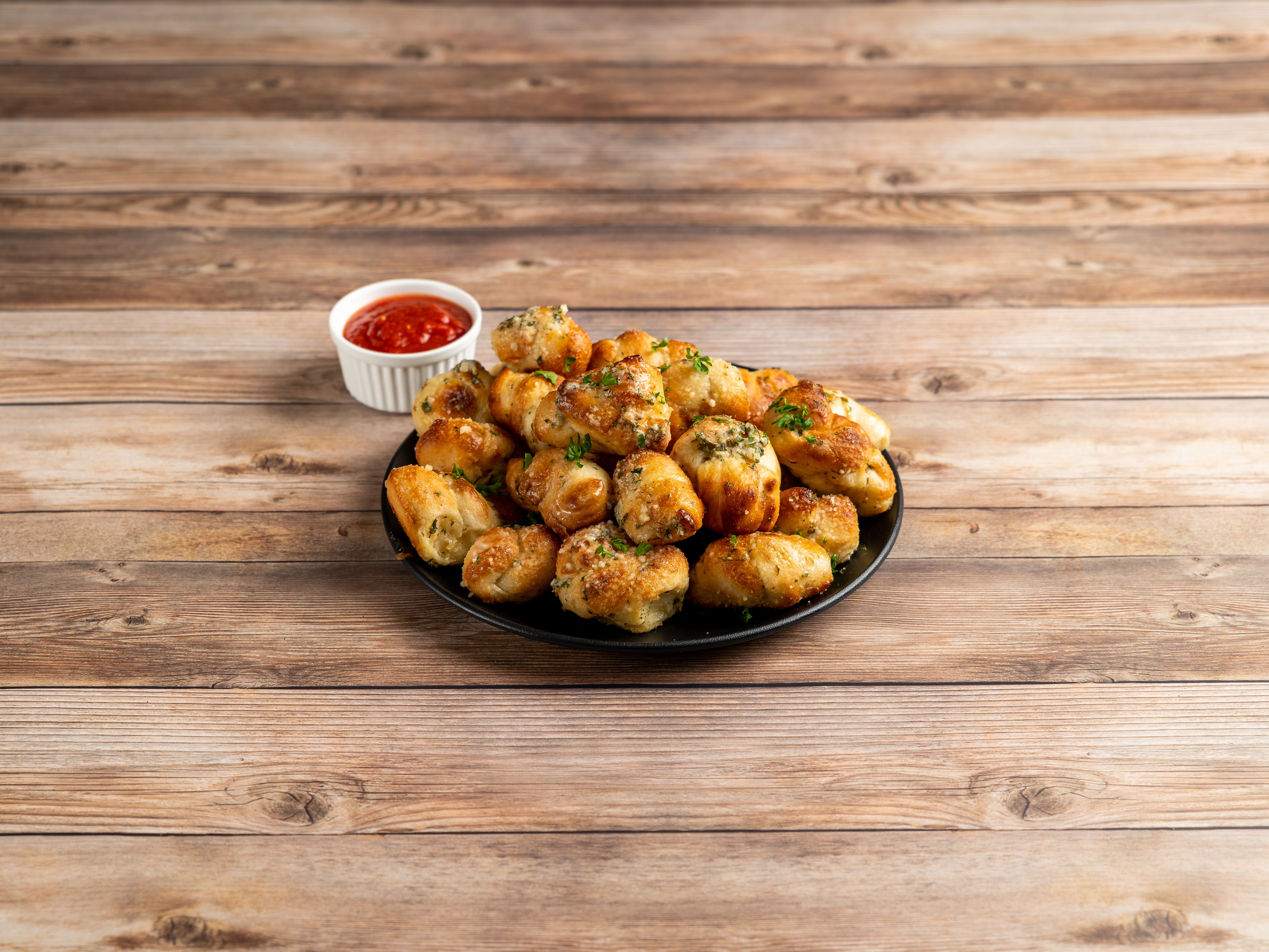 Order Garlic Knots food online from Endzone Pizza store, Charlottesville on bringmethat.com