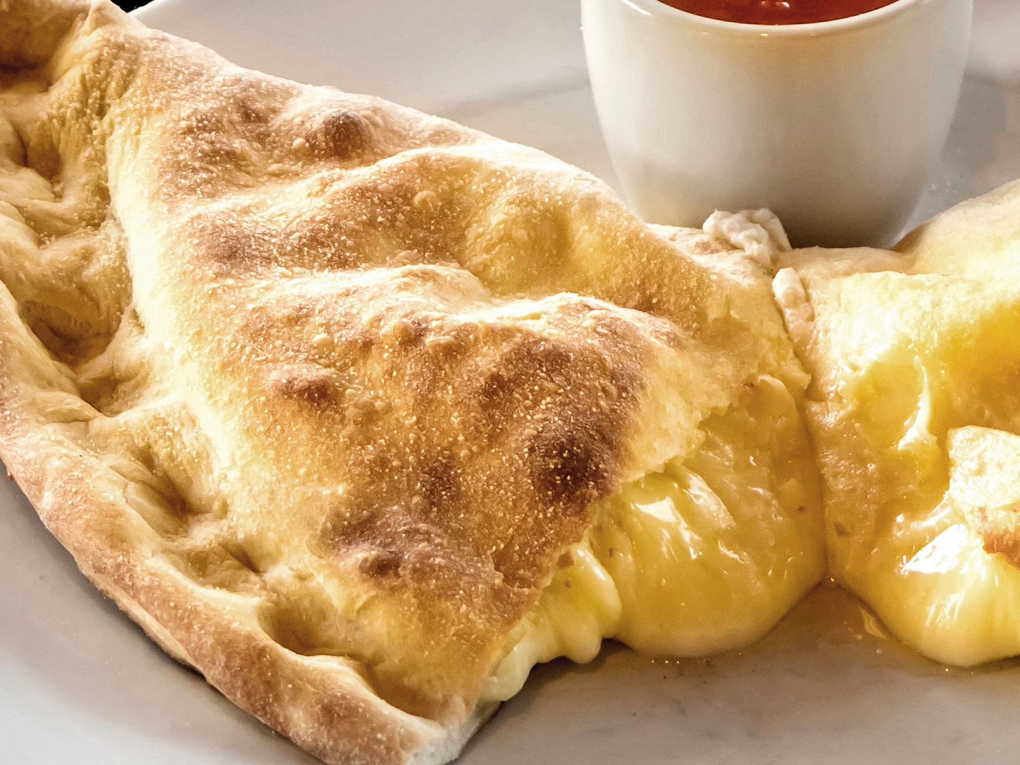 Order 18" Calzone food online from Marco's store, Huntington Station on bringmethat.com