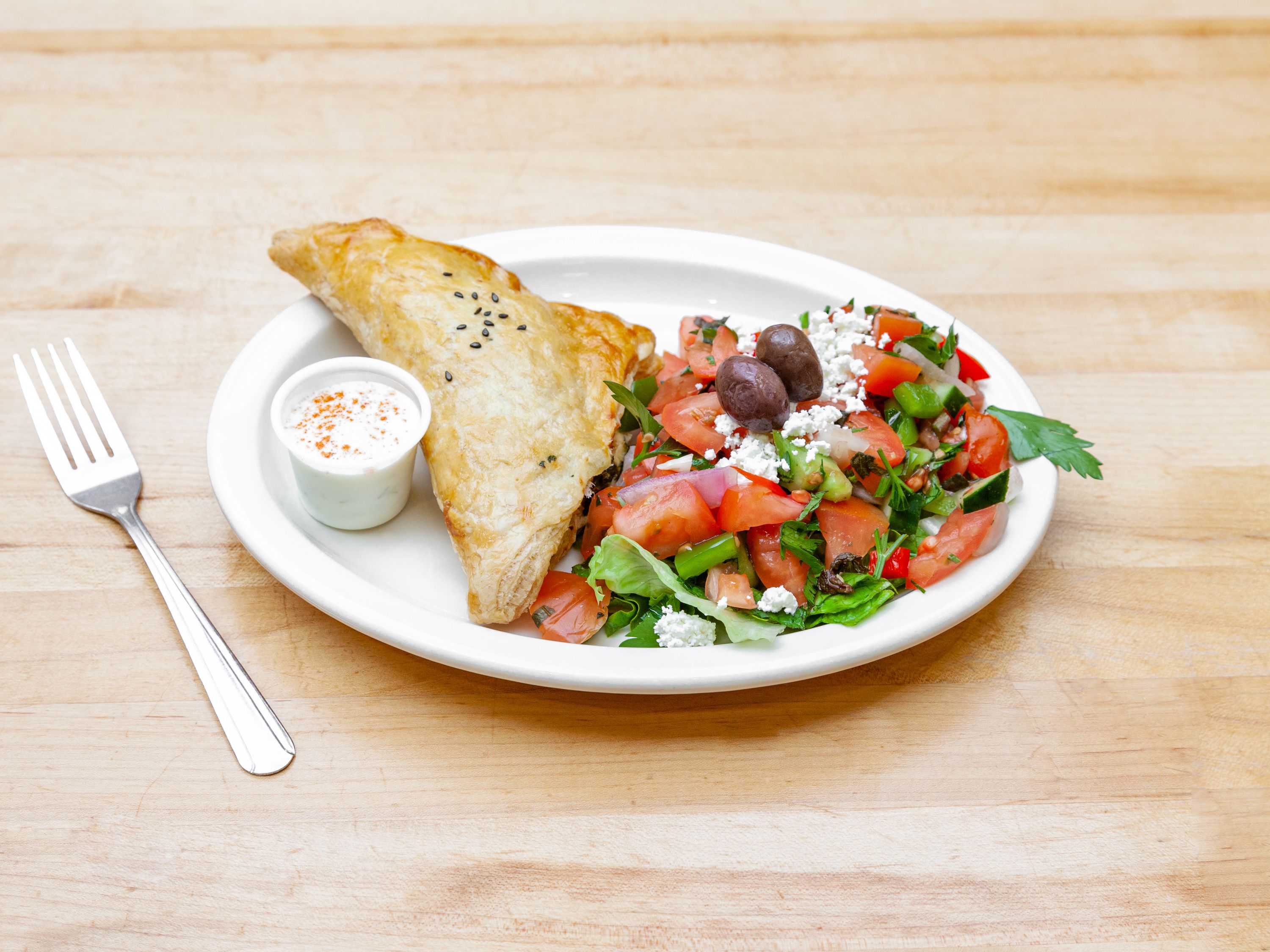 Order Spanakopita with Greek Salad food online from Island Grill - Redmond store, Bellevue on bringmethat.com
