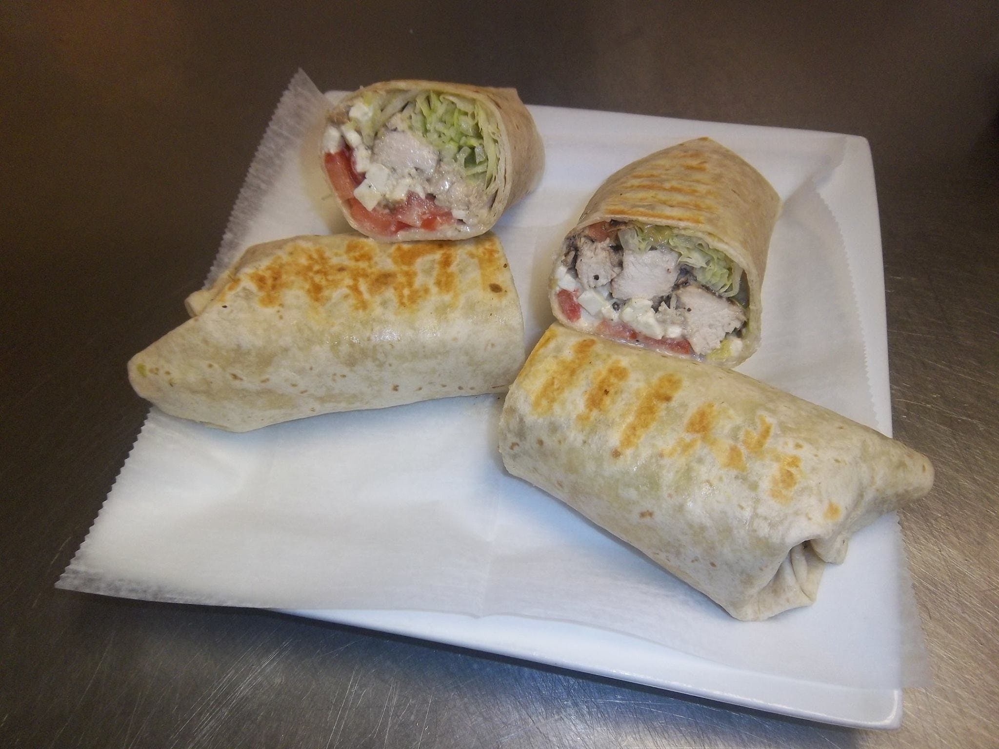 Order Chicken Kabob Wrap - Wrap food online from MVP Pizzeria store, Woonsocket on bringmethat.com