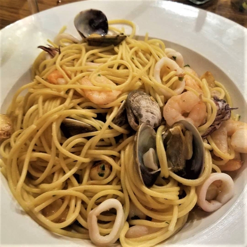 Order Spaghetti di Mare food online from Rosti Tuscan Kitchen store, Santa Monica on bringmethat.com