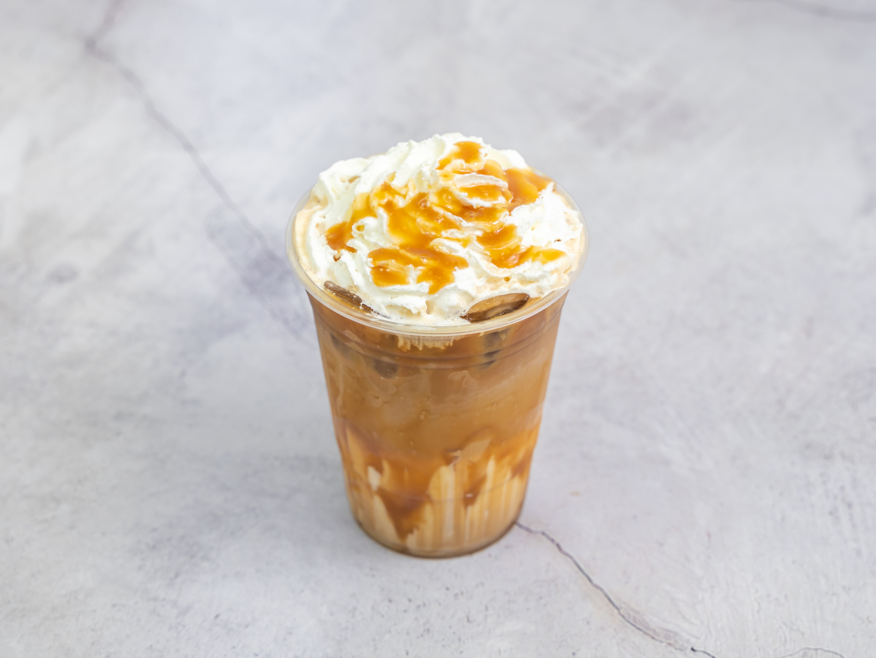 Order Cold Caramel Macchiato 20oz food online from Nameless Tea And Coffee store, San Francisco on bringmethat.com