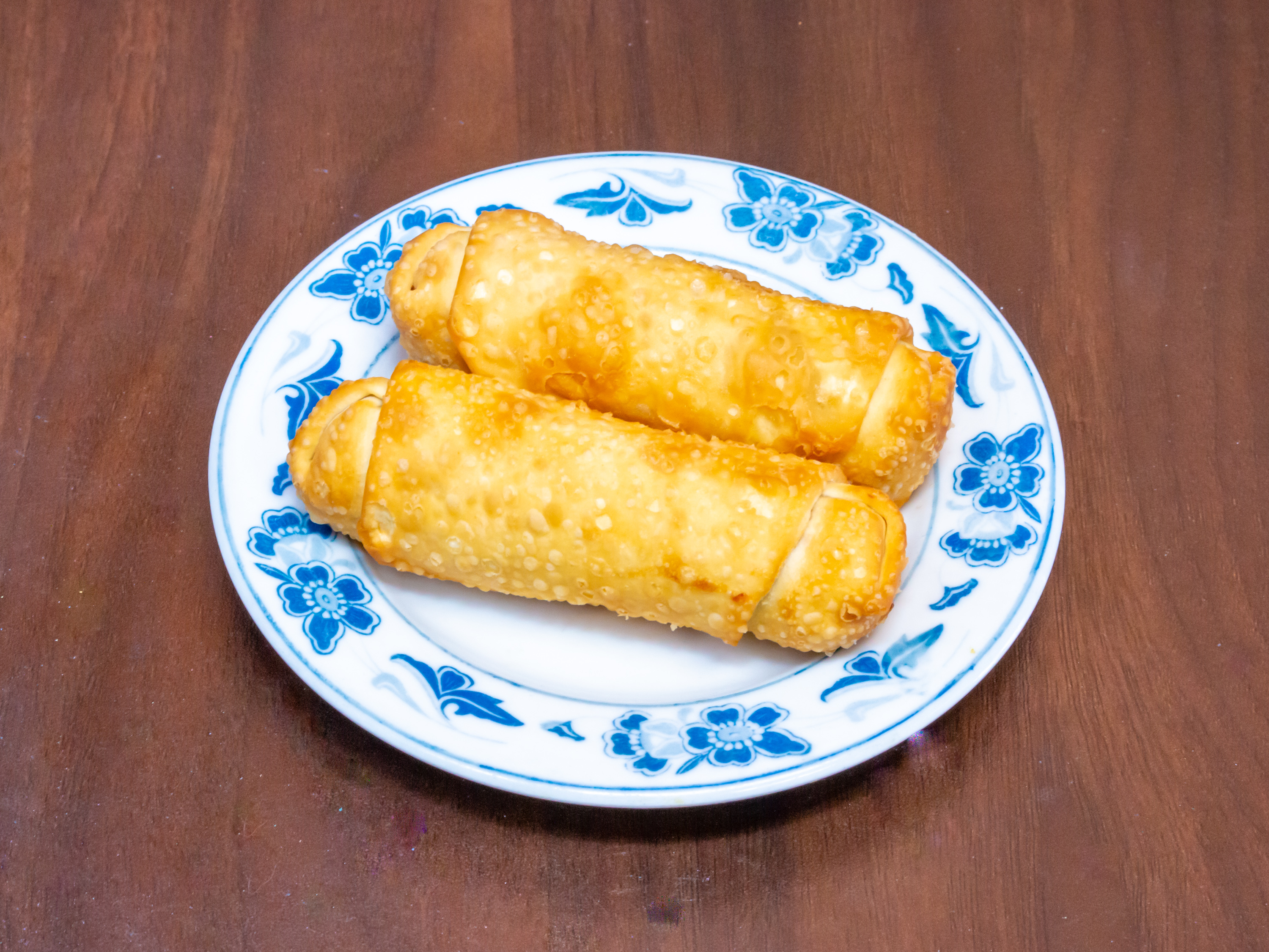 Order 101. Two Egg Rolls food online from Sizzling Wok store, Schaumburg on bringmethat.com