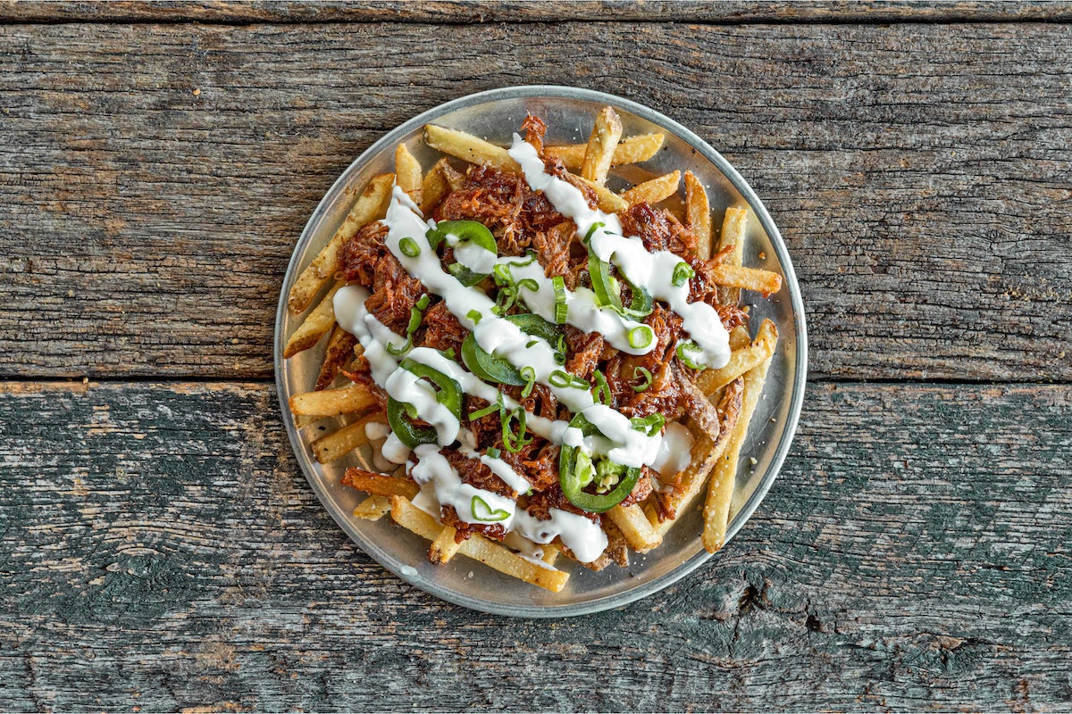 Order Loaded Pork Fries (Limited Time Offer) food online from Native Grill & Wings store, Tucson on bringmethat.com