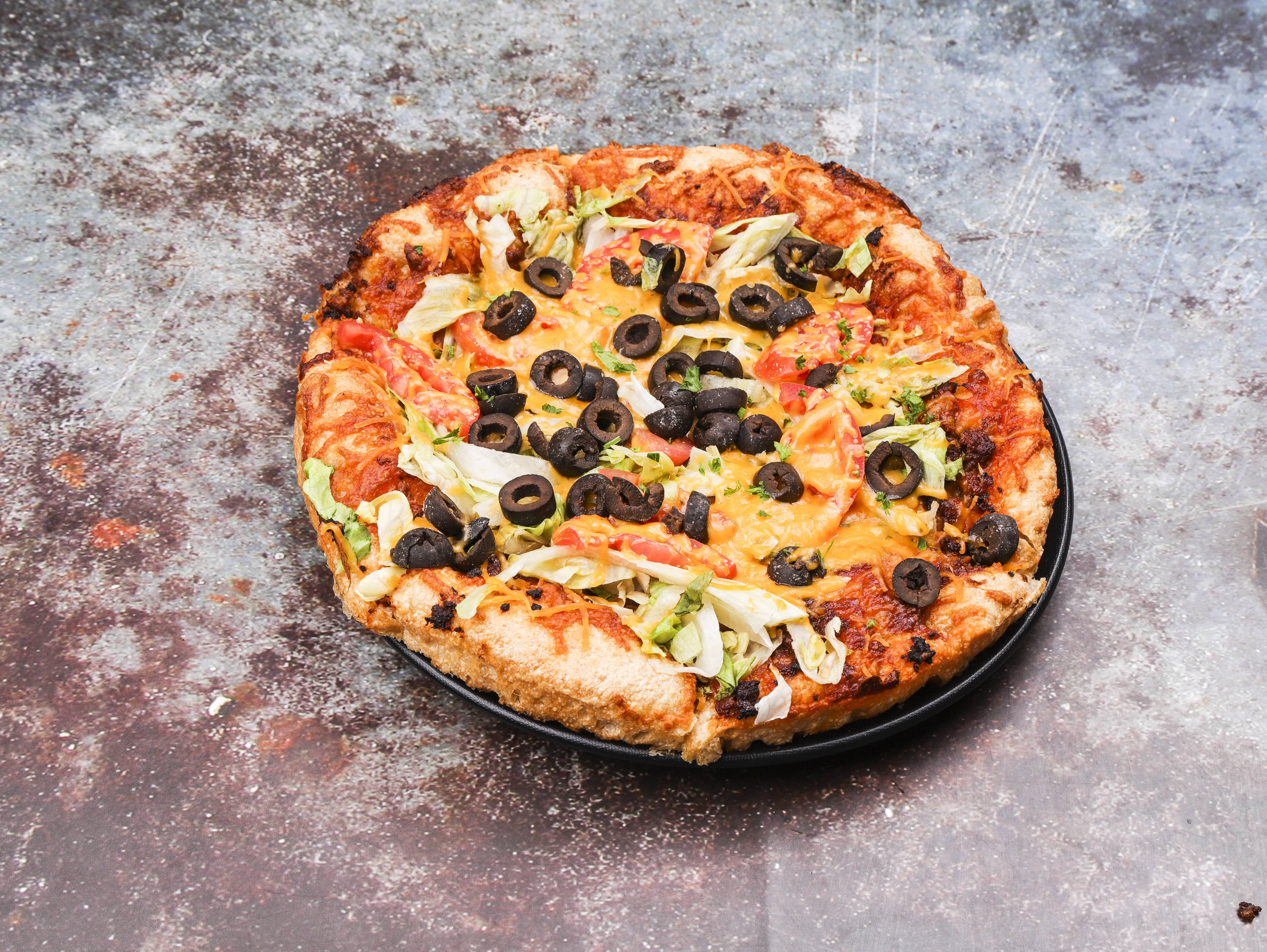 Order Taco Pizza food online from Dandino Pizza & More store, Toledo on bringmethat.com