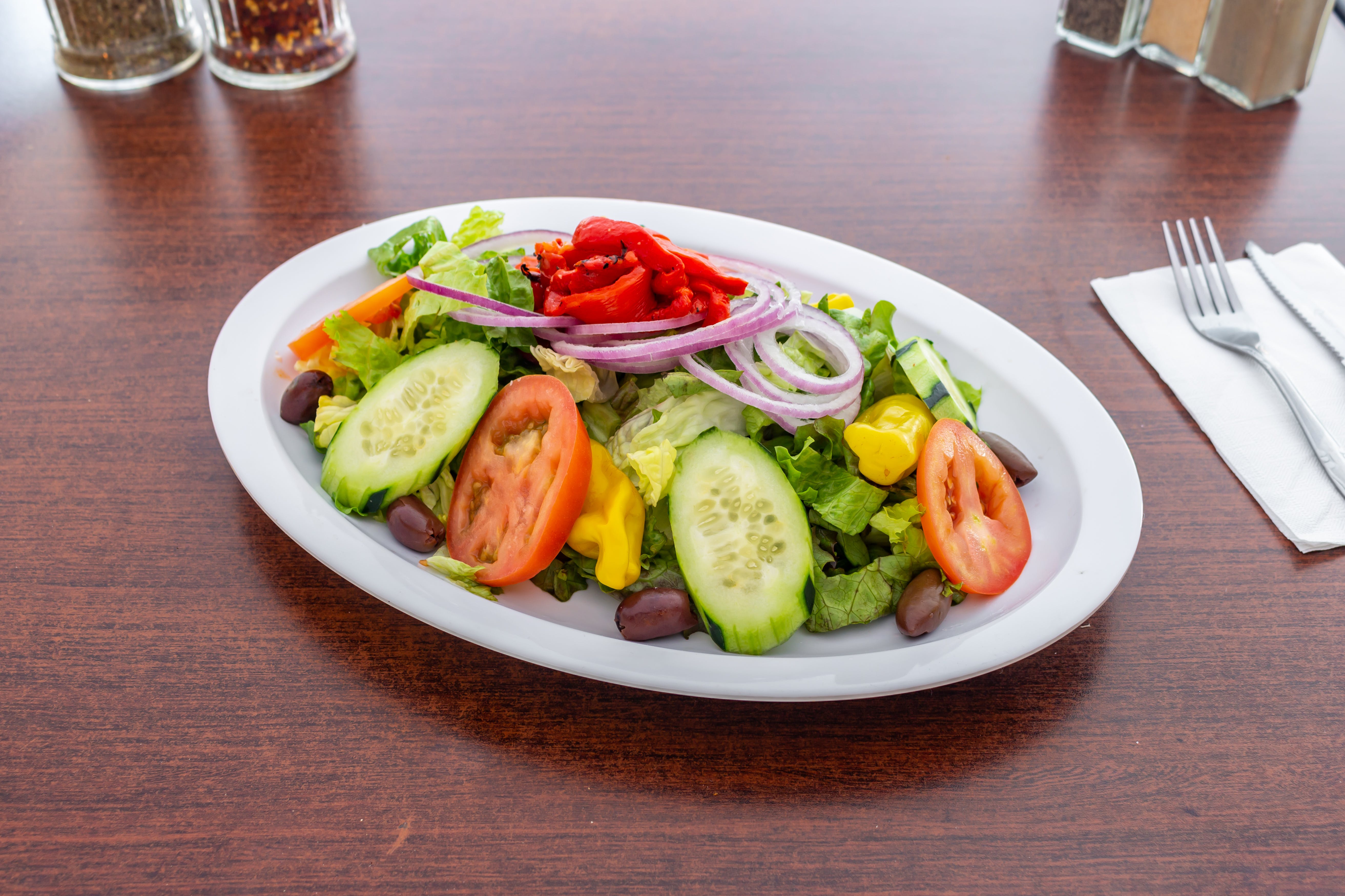 Order Tossed Salad - Salad food online from Sopranos Pizzeria store, New Milford on bringmethat.com
