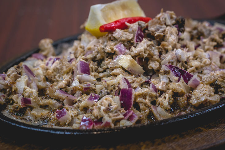 Order Sizzling Pork Sisig food online from Matthew's Grill store, Gaithersburg on bringmethat.com