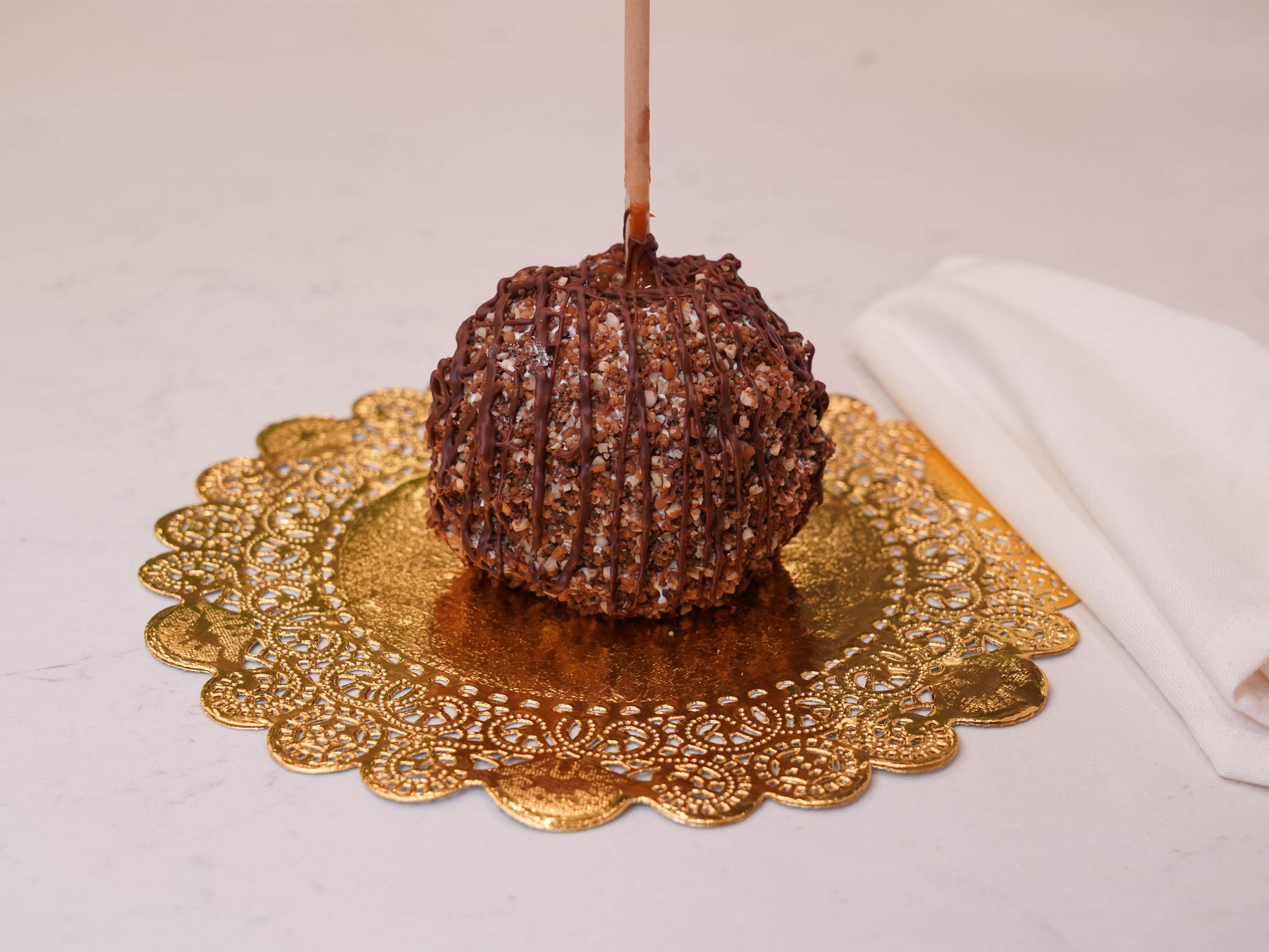 Order English Toffee Caramel Apple food online from Chocolate Wishes And Treats store, Clovis on bringmethat.com