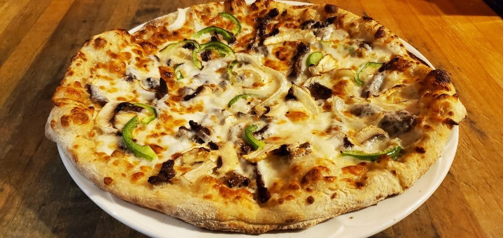 Order Personal Philly Cheesesteak Pizza - Personal 10" food online from Wild Tiger Pizza store, Seattle on bringmethat.com