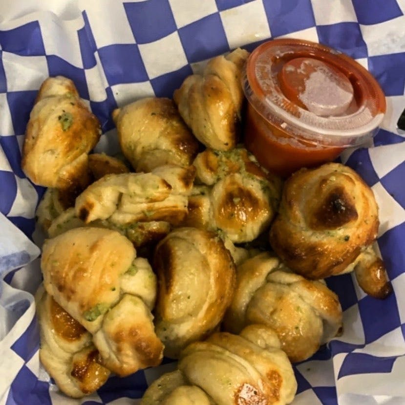 Order Garlic Knots - 12 Pieces food online from Leola Pizza Place store, Leola on bringmethat.com