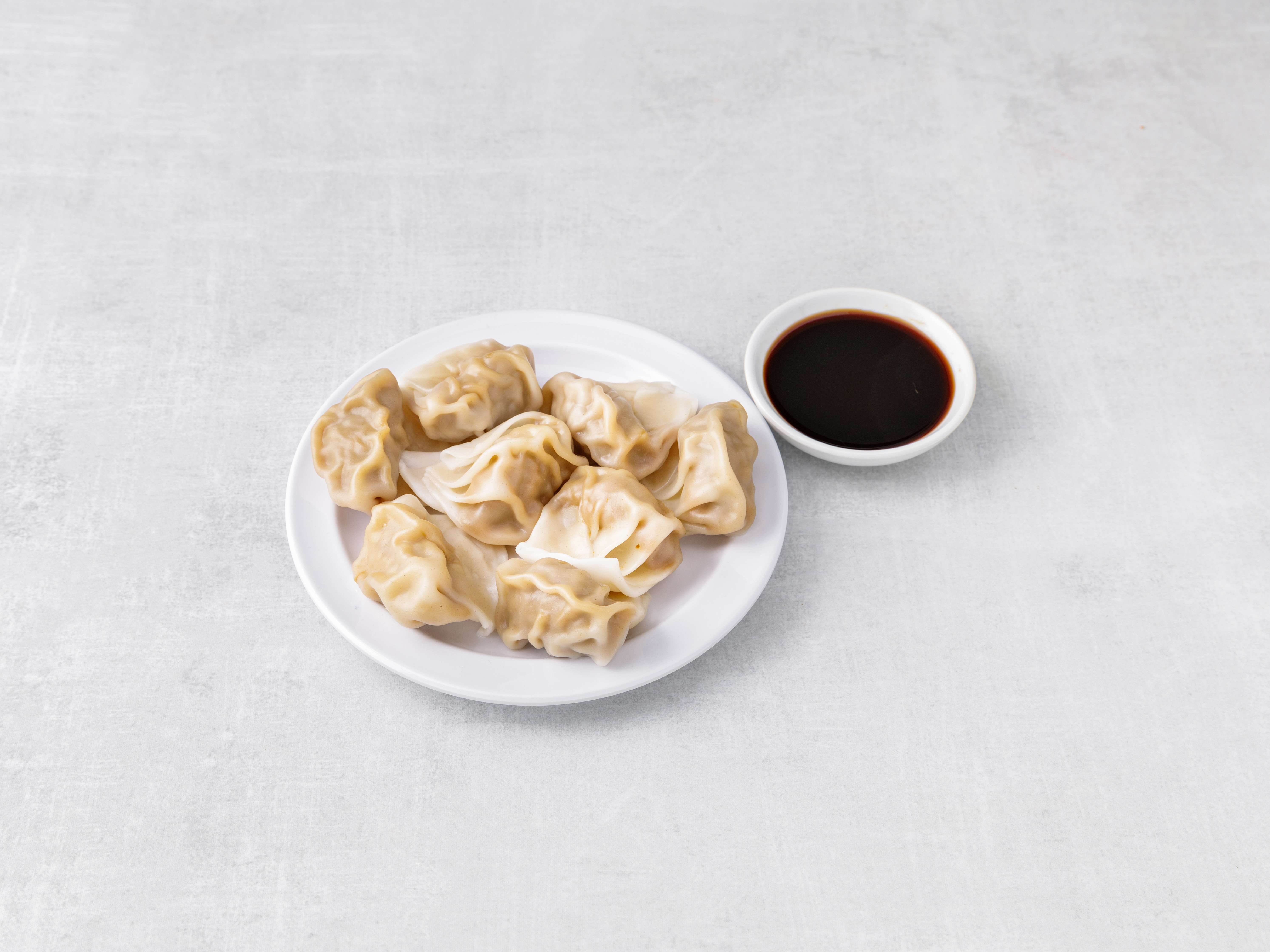Order 11. Steamed Dumpling food online from New Good Friends store, Bayonne on bringmethat.com