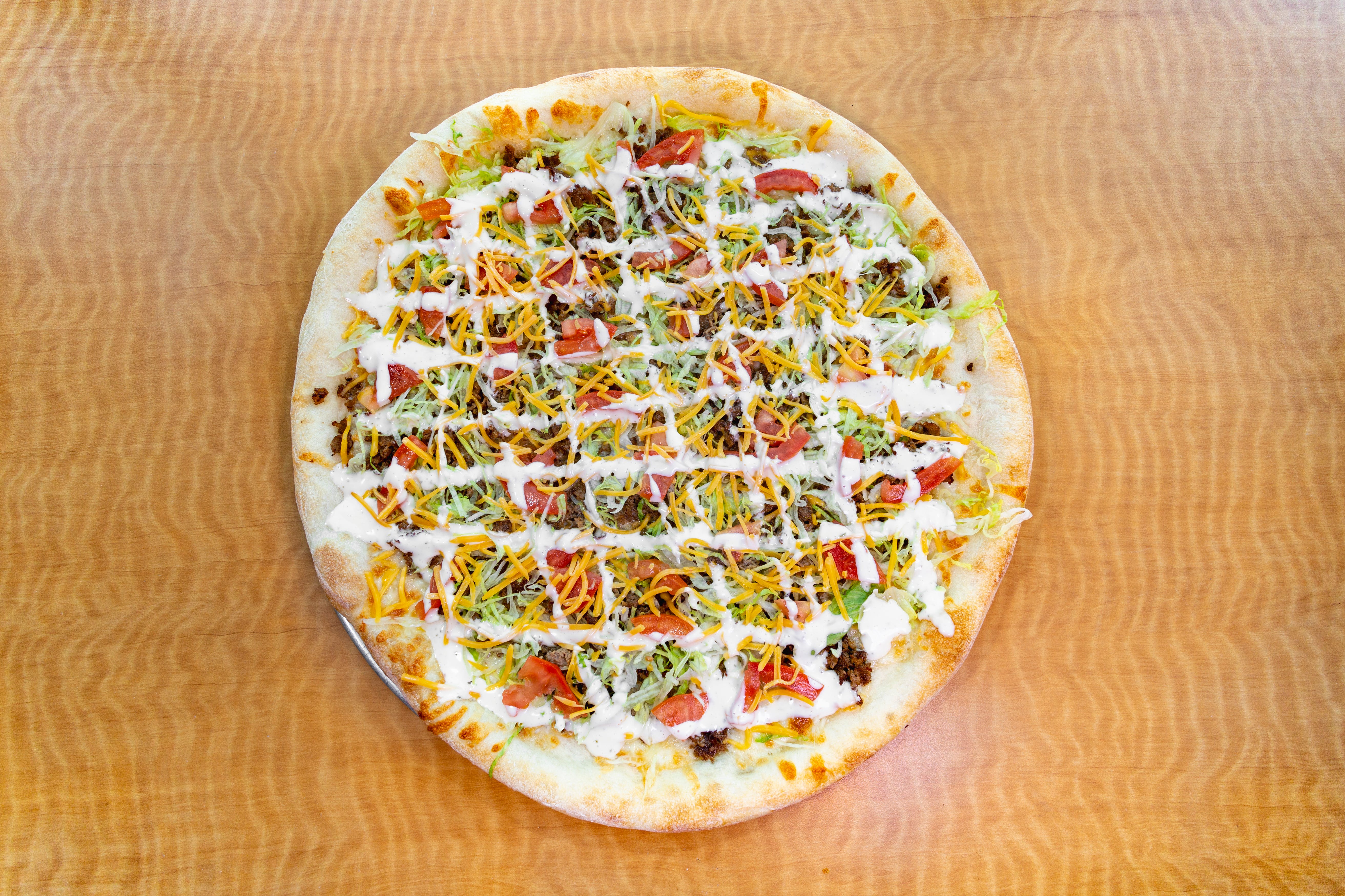 Order Taco Pizza - Small 14'' food online from Mario Cafe & Pizzeria store, East Greenville on bringmethat.com