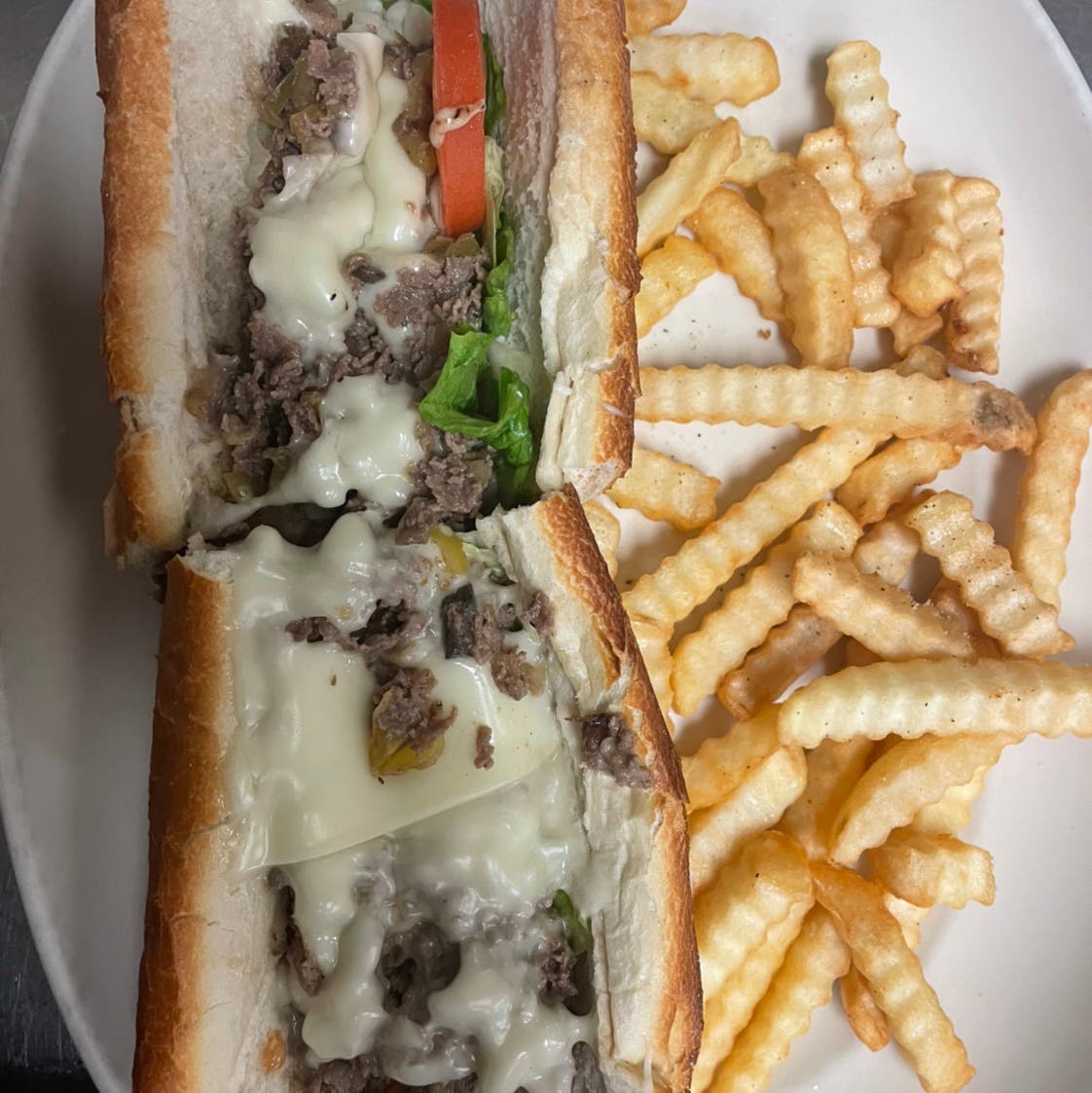Order Philly Cheesesteak The Work's Sandwich - Sandwich food online from Casa Nostra Italian Cuisine store, Greeneville on bringmethat.com
