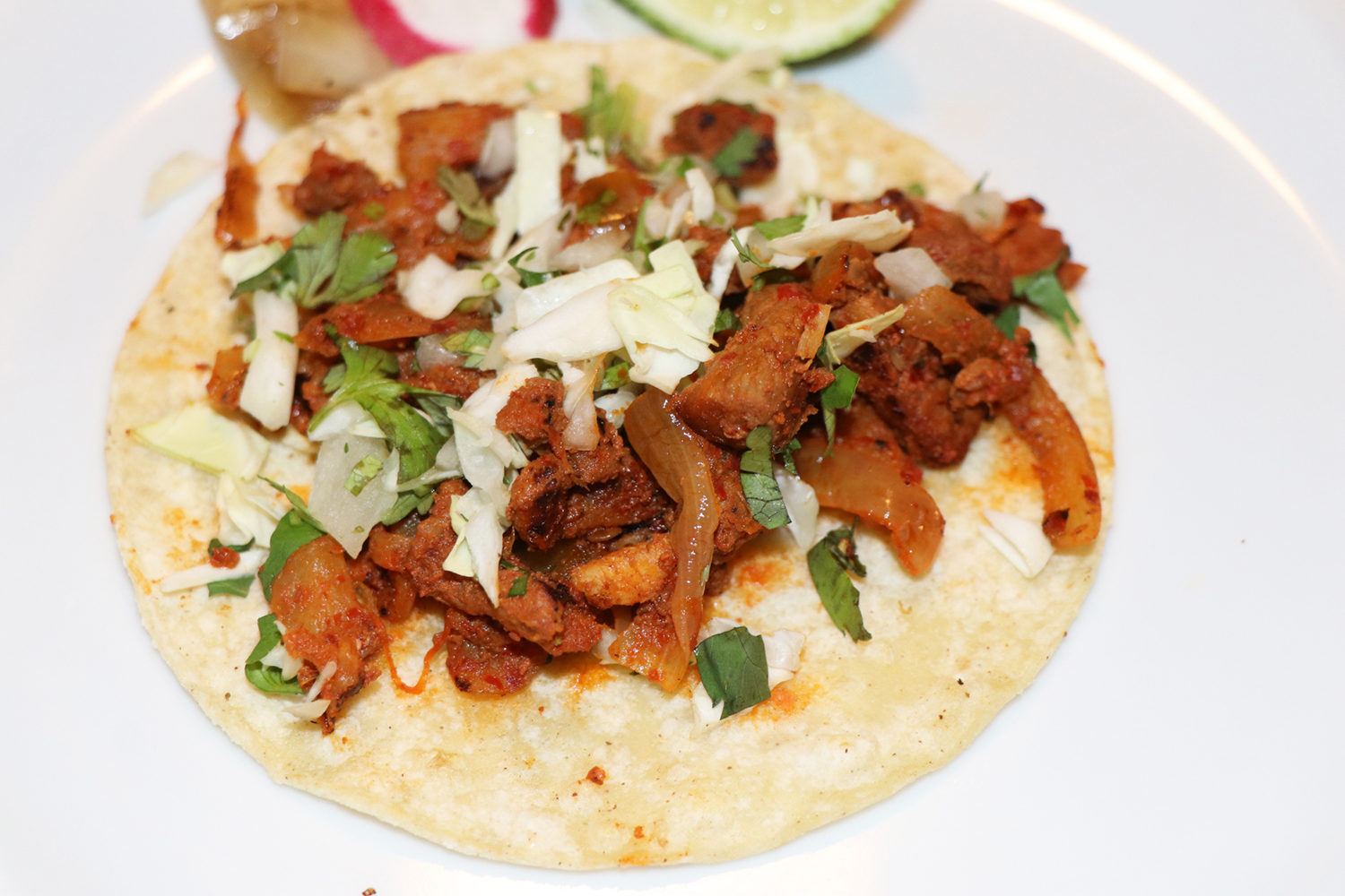 Order Al Pastor Taco food online from Toluco Mexican Kitchen store, Palo Alto on bringmethat.com