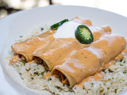 Order Southwest Seafood Enchiladas food online from Rockfish Seafood Grill store, Houston on bringmethat.com