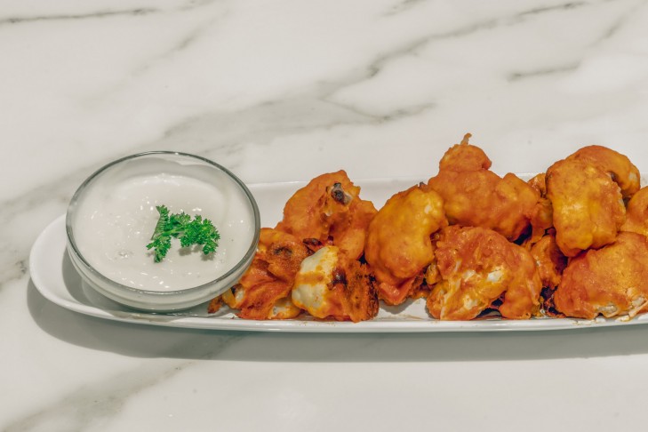 Order Spicy Buffalo Cauliflower food online from Indian Street Cafe store, San Jose on bringmethat.com