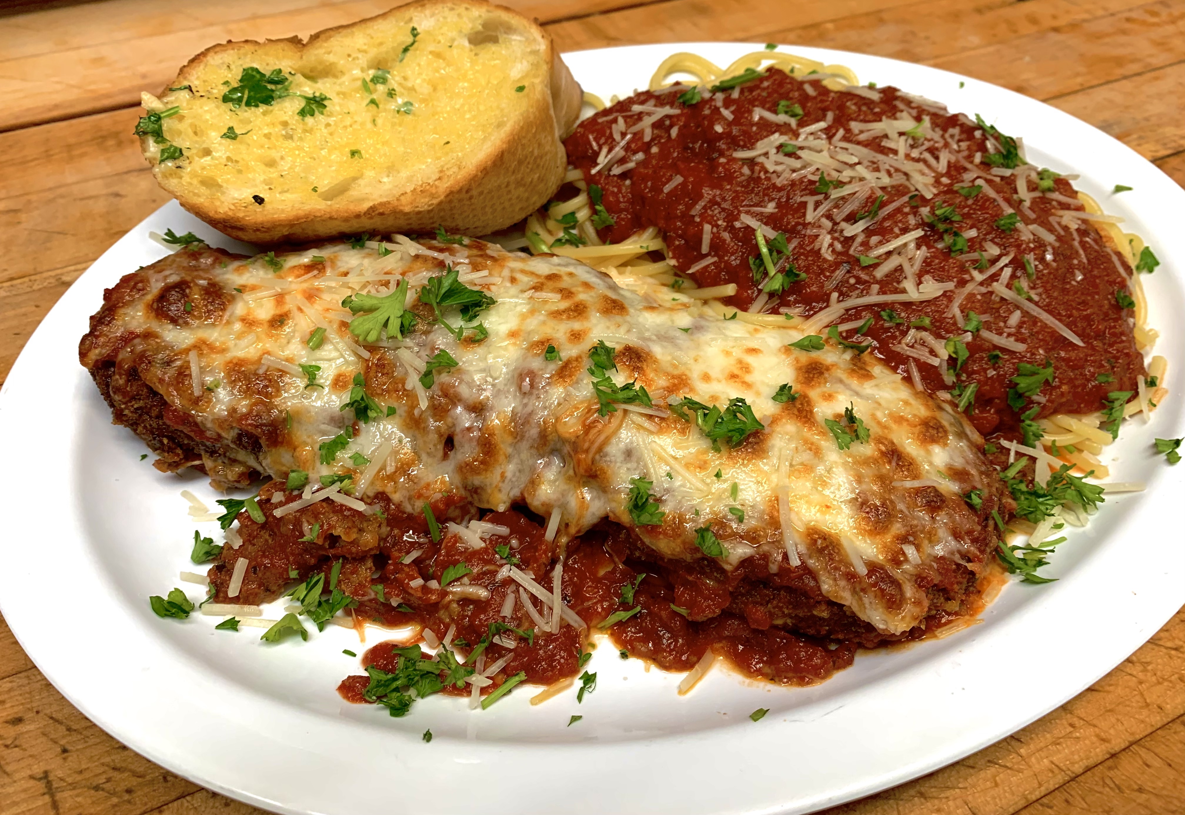 Order Veal Pargminana food online from Augustino Italian Restaurant store, Garden Grove on bringmethat.com