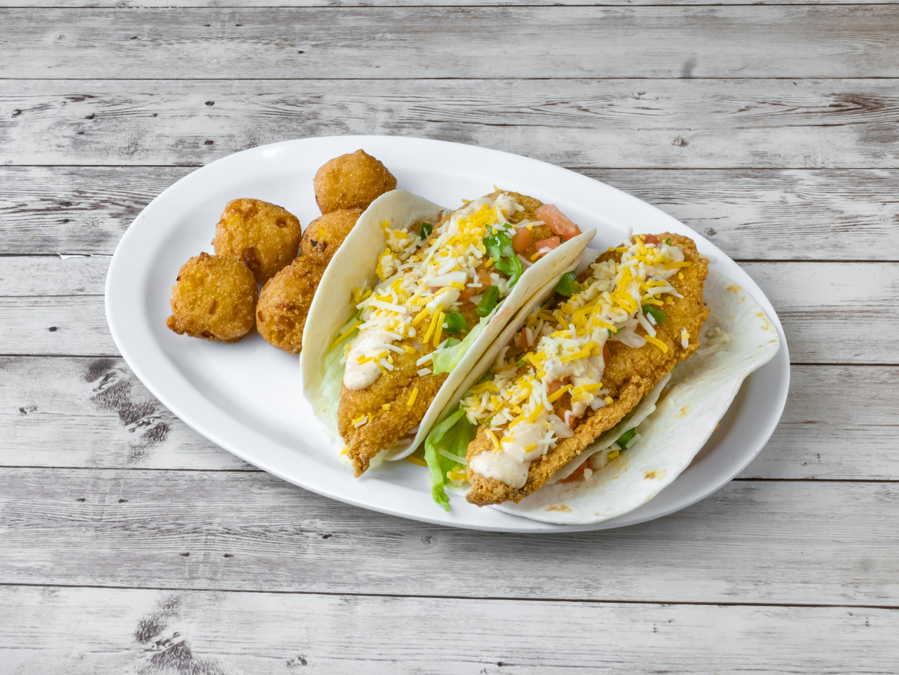 Order M2. 2 Pieces Taco food online from Fish Skillet Seafood store, Houston on bringmethat.com