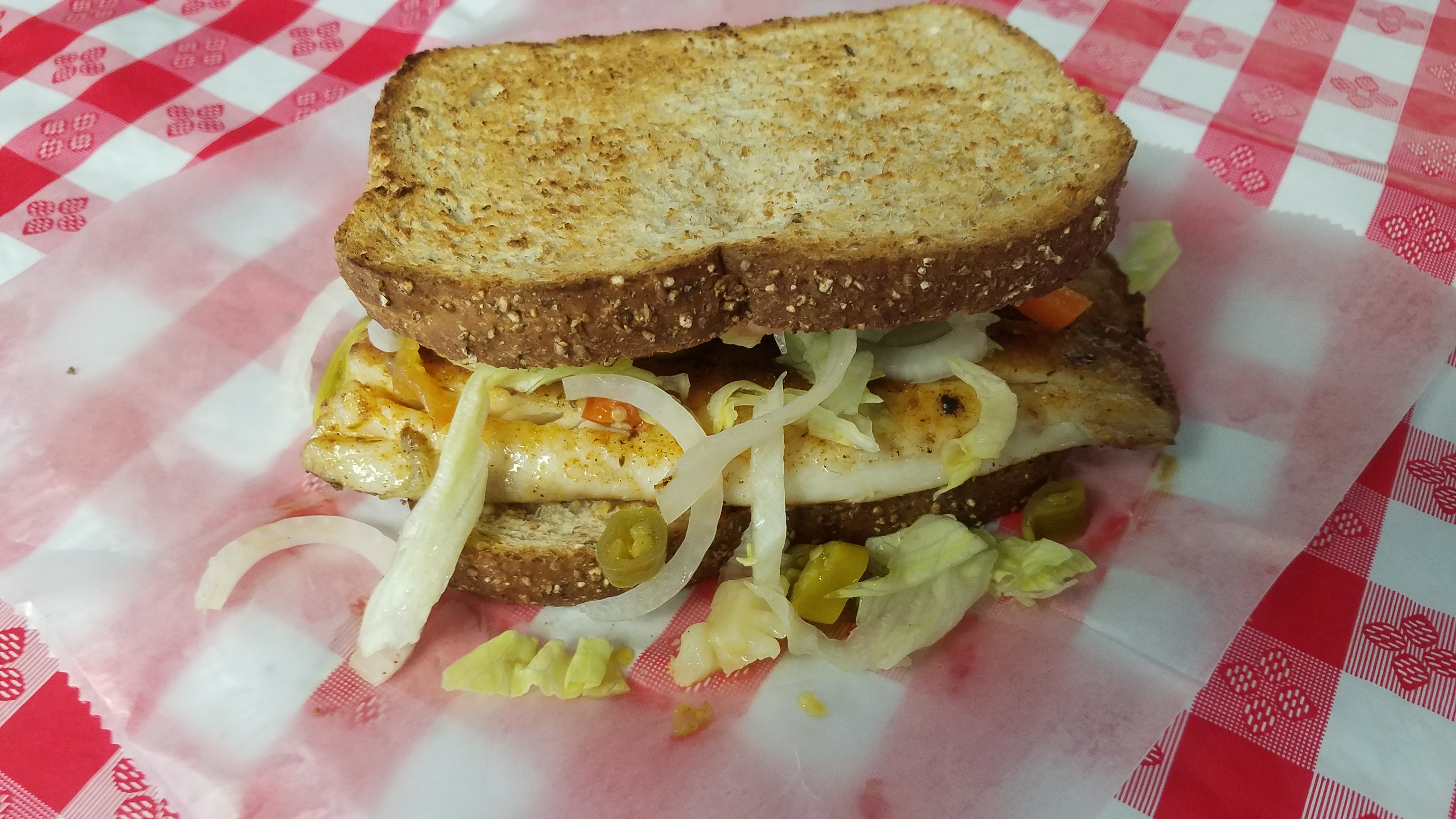 Order Grilled Tilapia Sandwich food online from Herms Palace store, Skokie on bringmethat.com