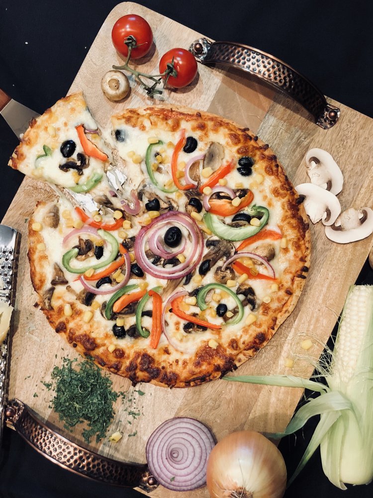 Order 10" Veggie Special Pizza food online from Roobic Cafe store, Glendale on bringmethat.com