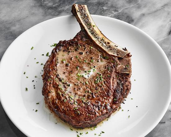 Order Prime Bone-In Ribeye  food online from Fleming's Prime Steakhouse & Wine Bar store, The Woodlands on bringmethat.com