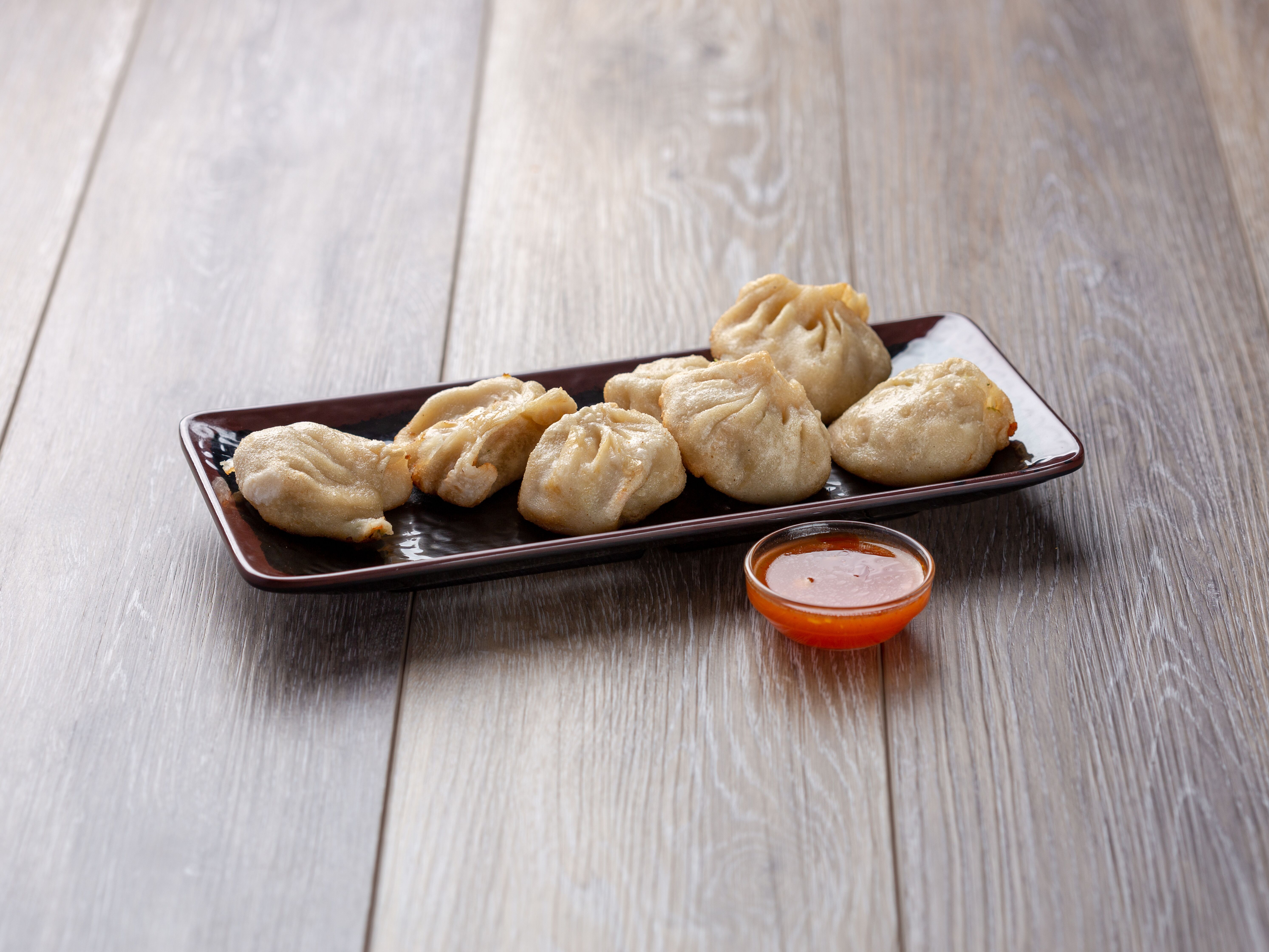 Order 5. Steamed Dumpling food online from Orient Express store, Hanover on bringmethat.com