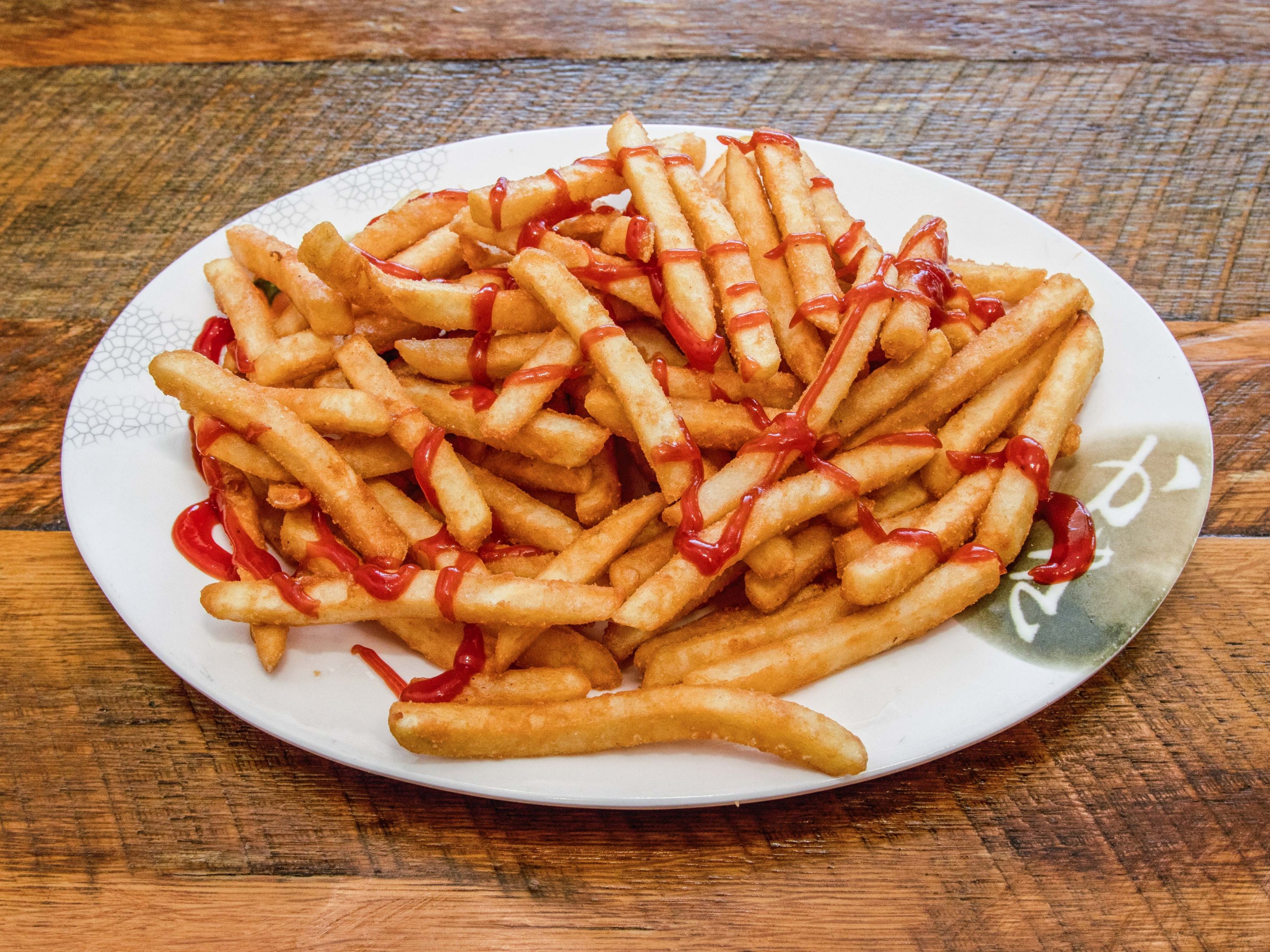 Order Regular Fries food online from Duccinis Pizza store, Falls Church on bringmethat.com