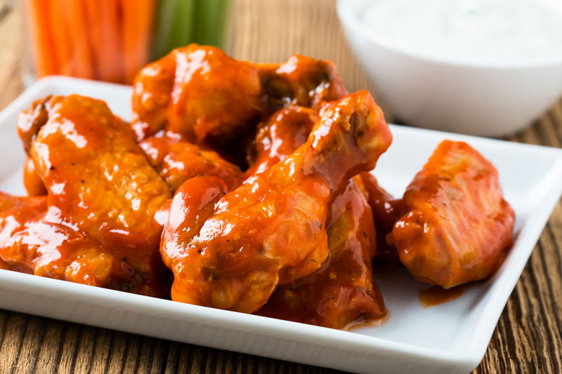 Order Thai Sriracha wings food online from The Chicken Hawkers store, Vacaville on bringmethat.com
