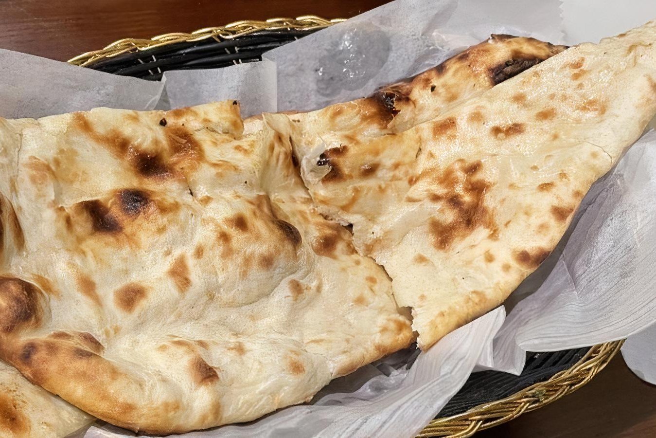 Order Butter Naan food online from Om Indian Cuisine store, San Francisco on bringmethat.com