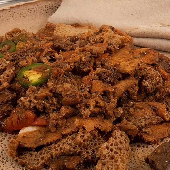 Order Tibs Firfir food online from Sheba's Ethiopian Kitchen store, Dallas on bringmethat.com