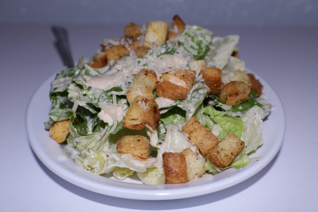 Order Caesar Salad food online from Panini store, Signal Hill on bringmethat.com