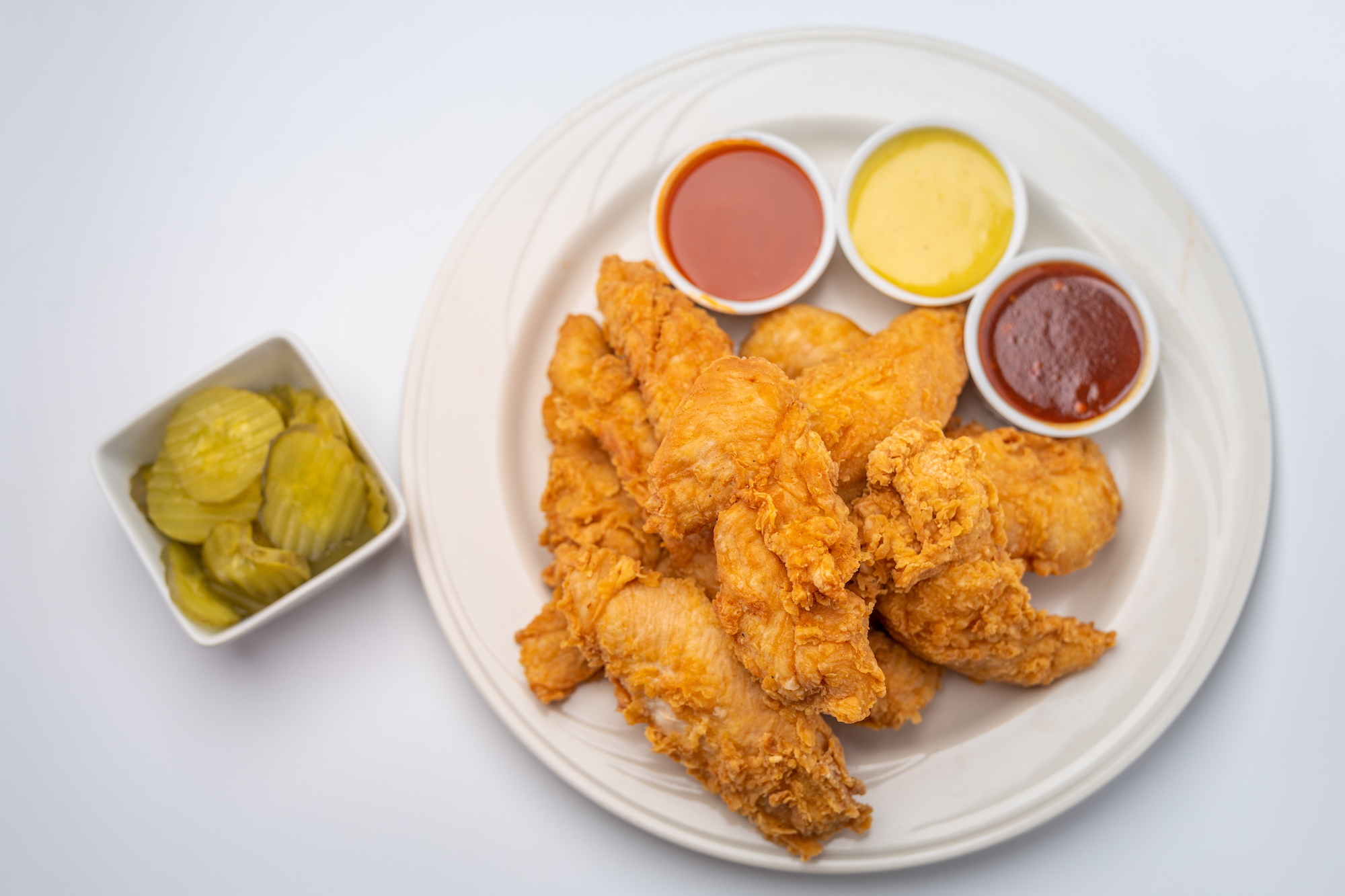 Order 20 Chicken Tenders and 3 Dips (R) food online from Red Nashville Hot Chicken store, Fullerton on bringmethat.com