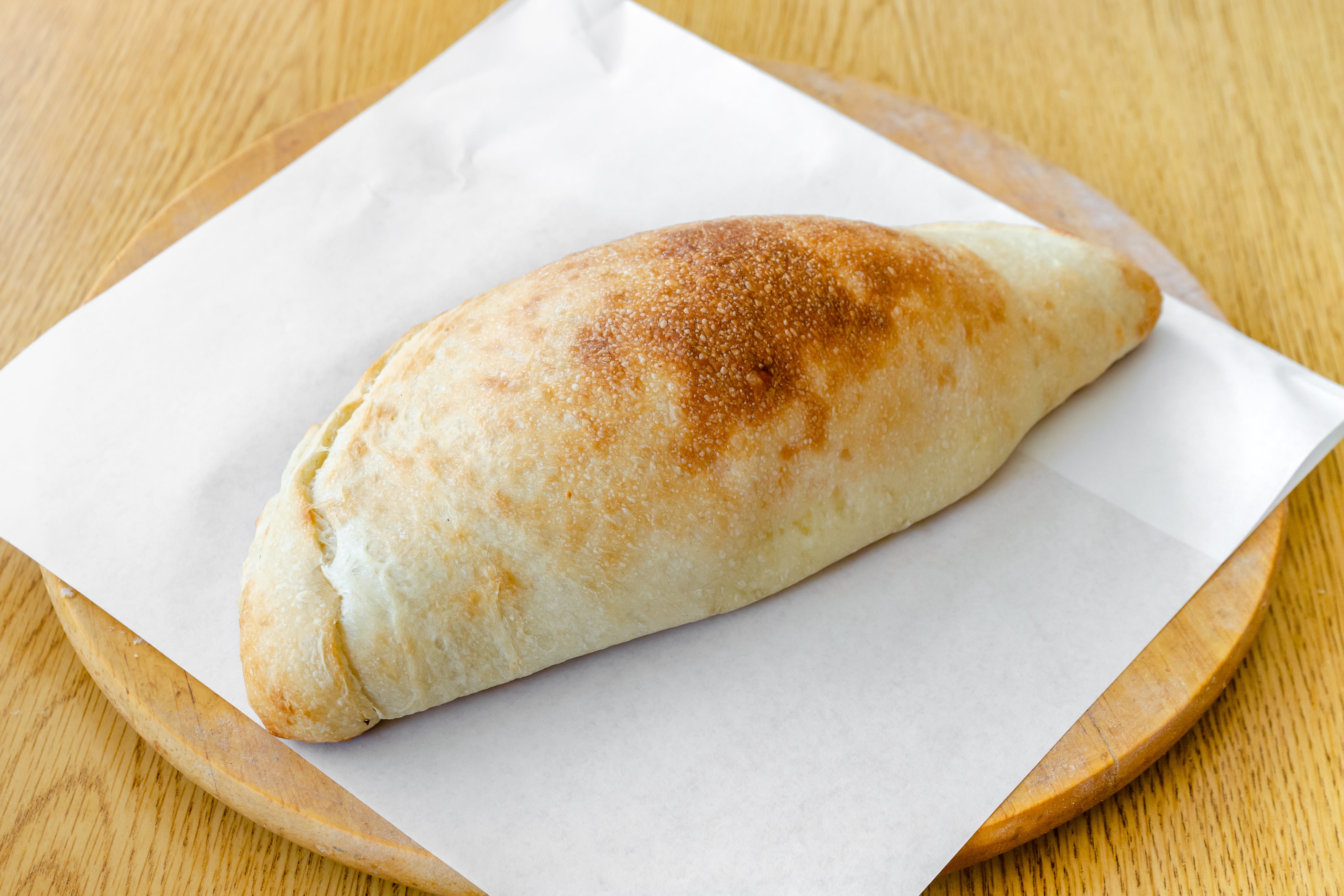 Order Cheese Calzone - Calzone food online from New Pizza On The Block store, West New York on bringmethat.com