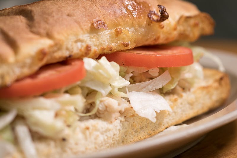 Order Turkey & Cheese Grinder - Half 9" food online from Mancino's Pizza & Grinders store, Holland on bringmethat.com