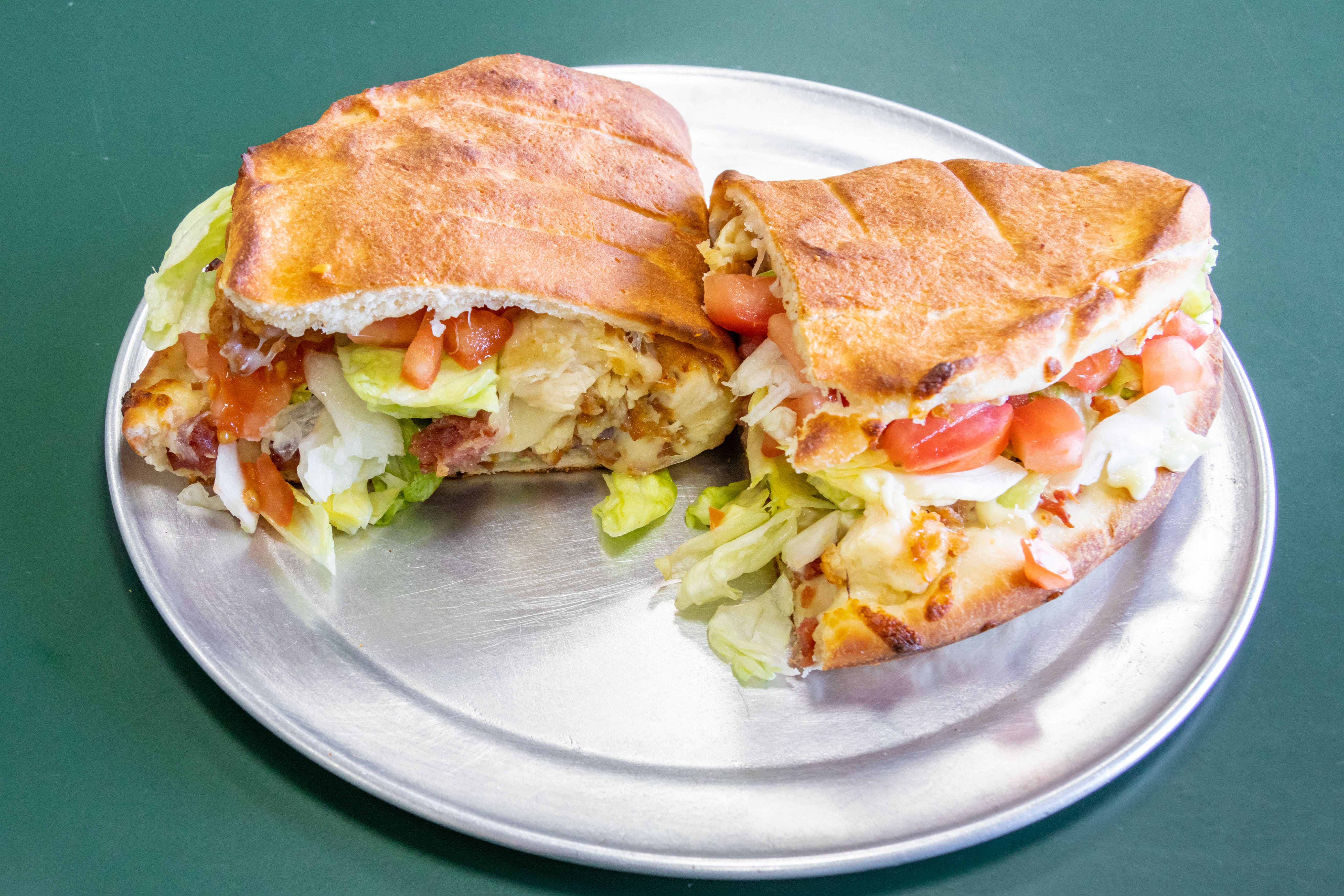 Order Chicken Club Calzone - Calzone food online from Casamel's Pizza store, Parma on bringmethat.com