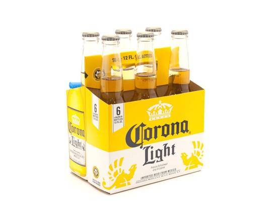 Order Corona Light 6 bottles | 4% abv food online from Pink Dot store, Lemon Grove on bringmethat.com