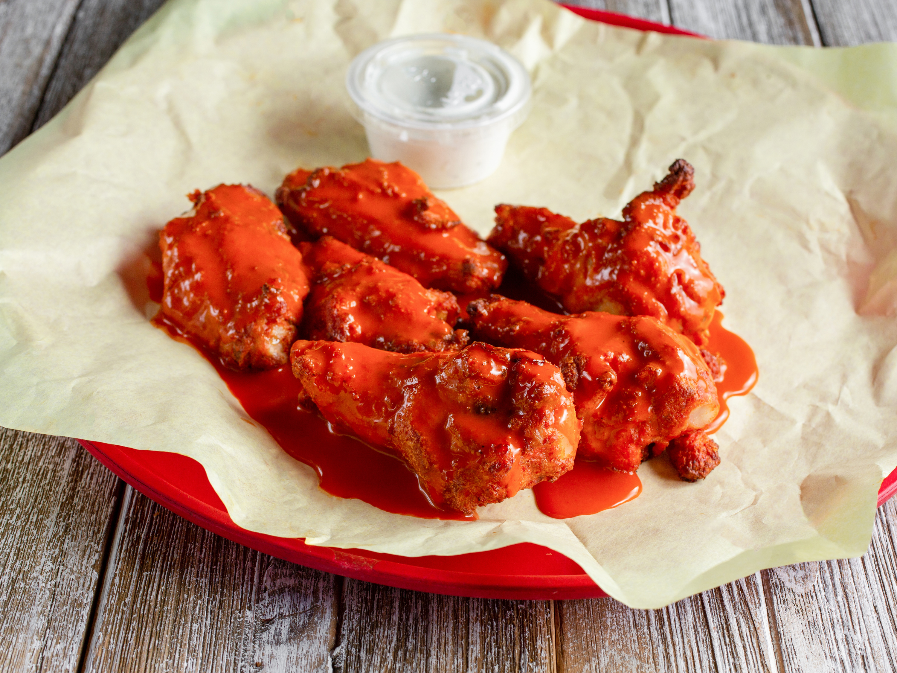 Order 6 Piece Regular Chicken Wings food online from Straw Hat Pizza store, Chino on bringmethat.com