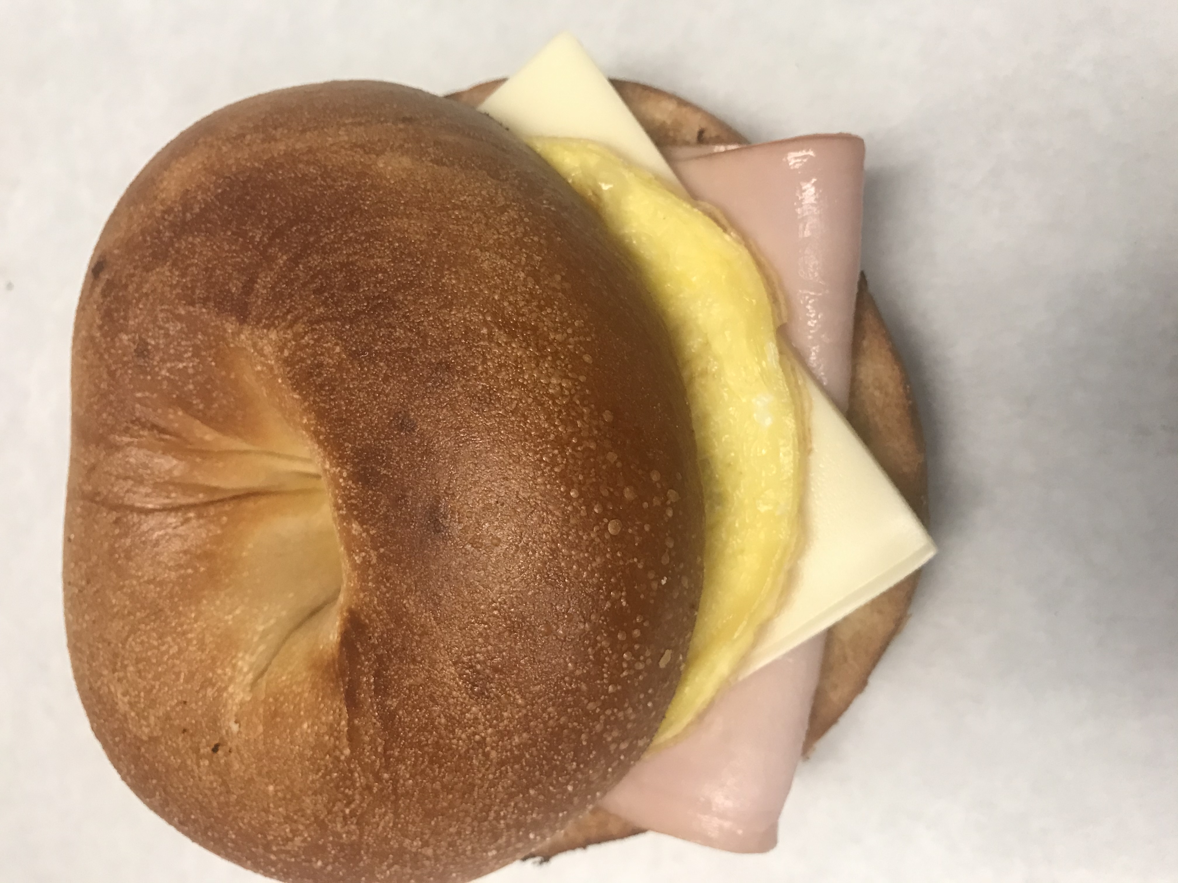 Order Ham, Egg and Cheese Bagel  food online from Michael Donuts store, Hungtington Beach on bringmethat.com