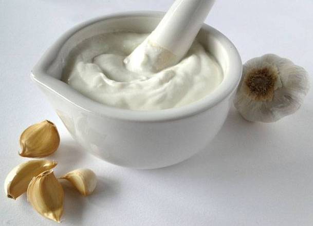 Order  Extra Garlic Sauce food online from GOLDEN GRILL AUTHENTIC LEBANESE CUISINE store, Fresno on bringmethat.com