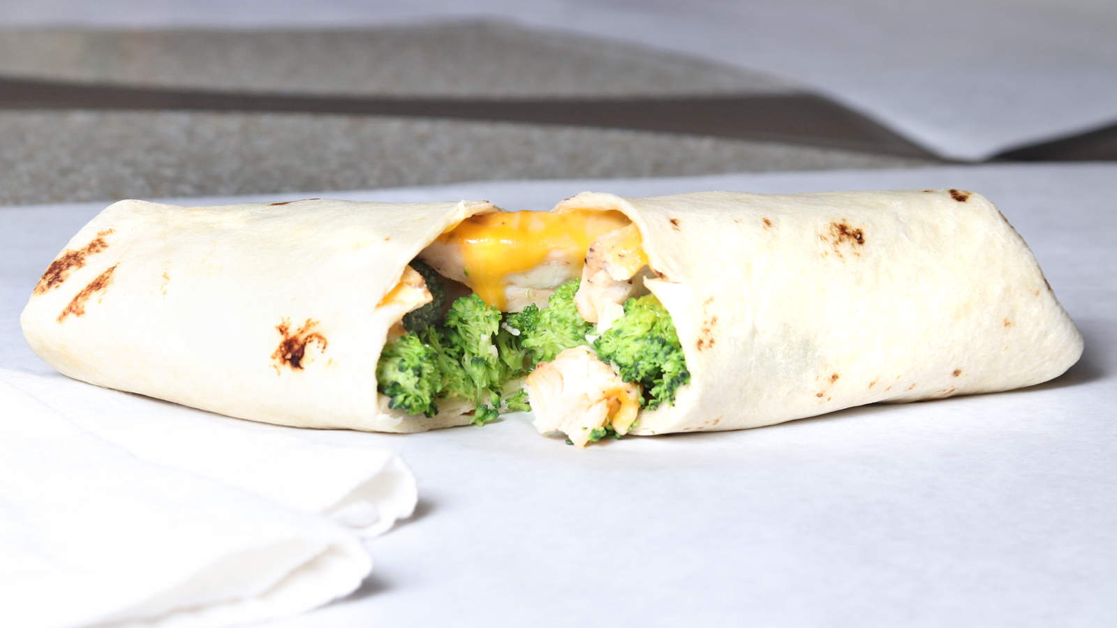 Order Chicken and Broccoli Wrap food online from Juice Kitchen store, Denver on bringmethat.com