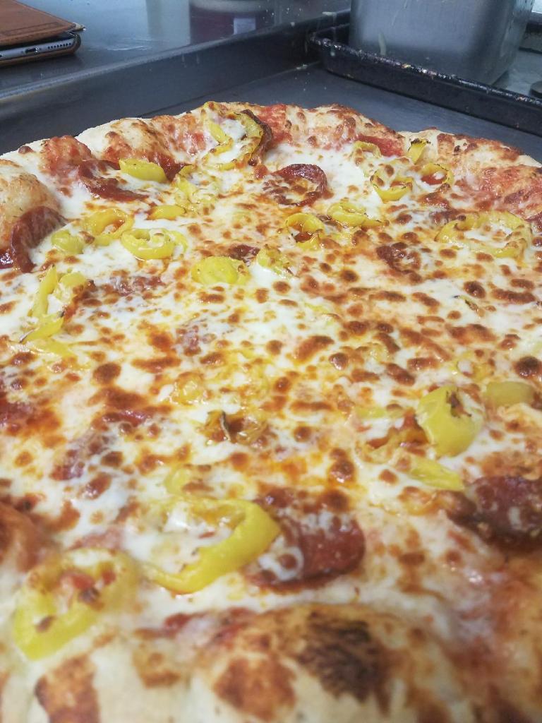 Order 1 Large Pizza 2 Toppings and 10 Wing Dings Special with 2 liter food online from Ray Pizza store, Detroit on bringmethat.com