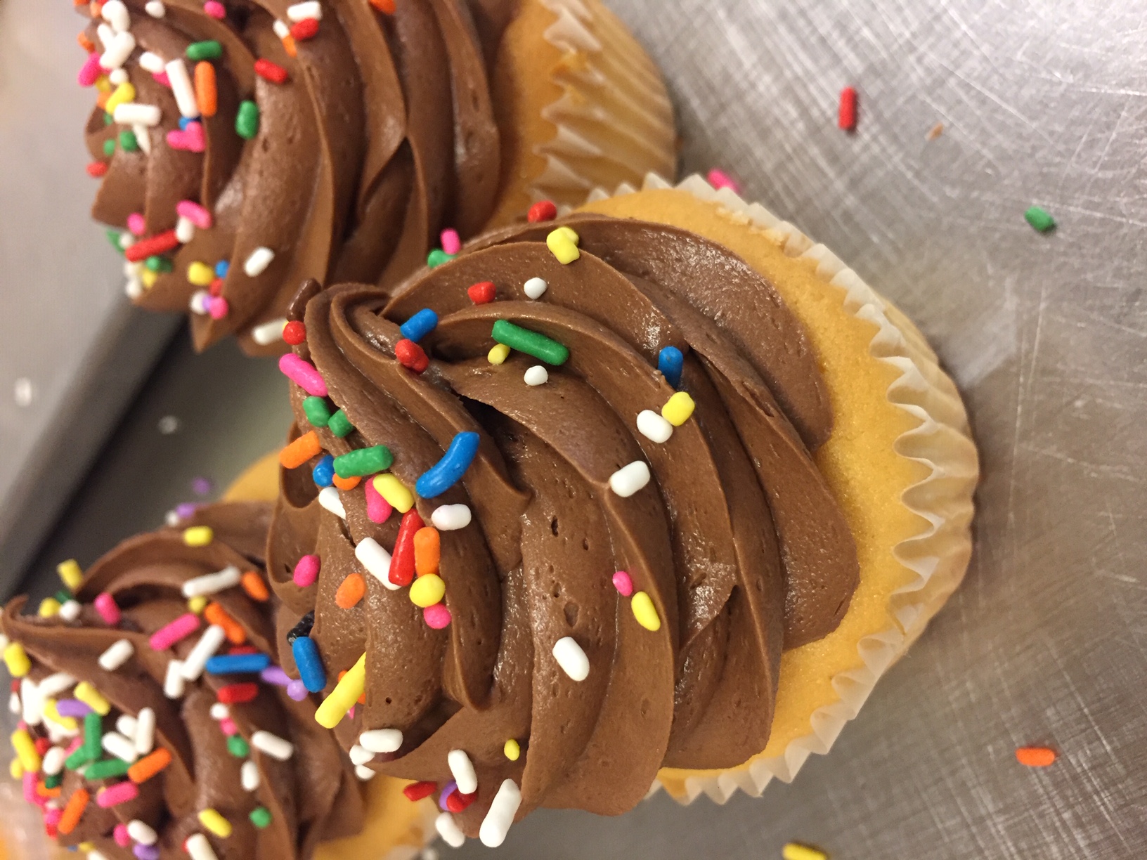 Order Cupcake with Sprinkles (INDIVIDUAL) food online from Savoia Pastry Shoppe store, Rochester on bringmethat.com