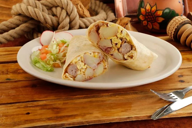 Order Sausage, Eggs, Potatoes and Cheese Burrito food online from Mexico Lindo store, Rancho Cucamonga on bringmethat.com