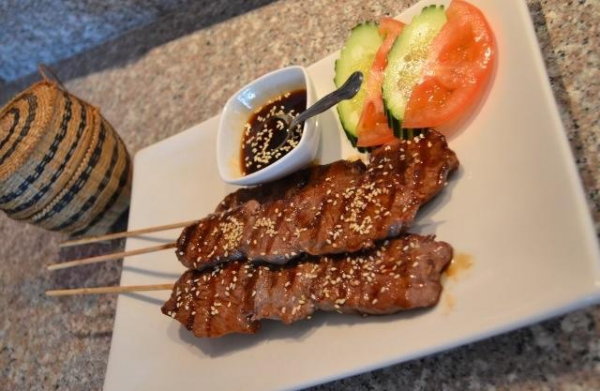Order SP15. Beef Skewer with Sticky Rice food online from Thai Pk Restaurant store, Portland on bringmethat.com