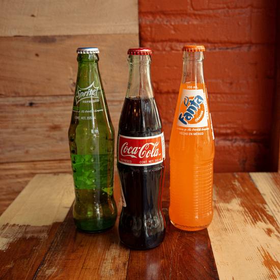 Order MEXICAN COKE food online from Lil Woody's store, Seattle on bringmethat.com