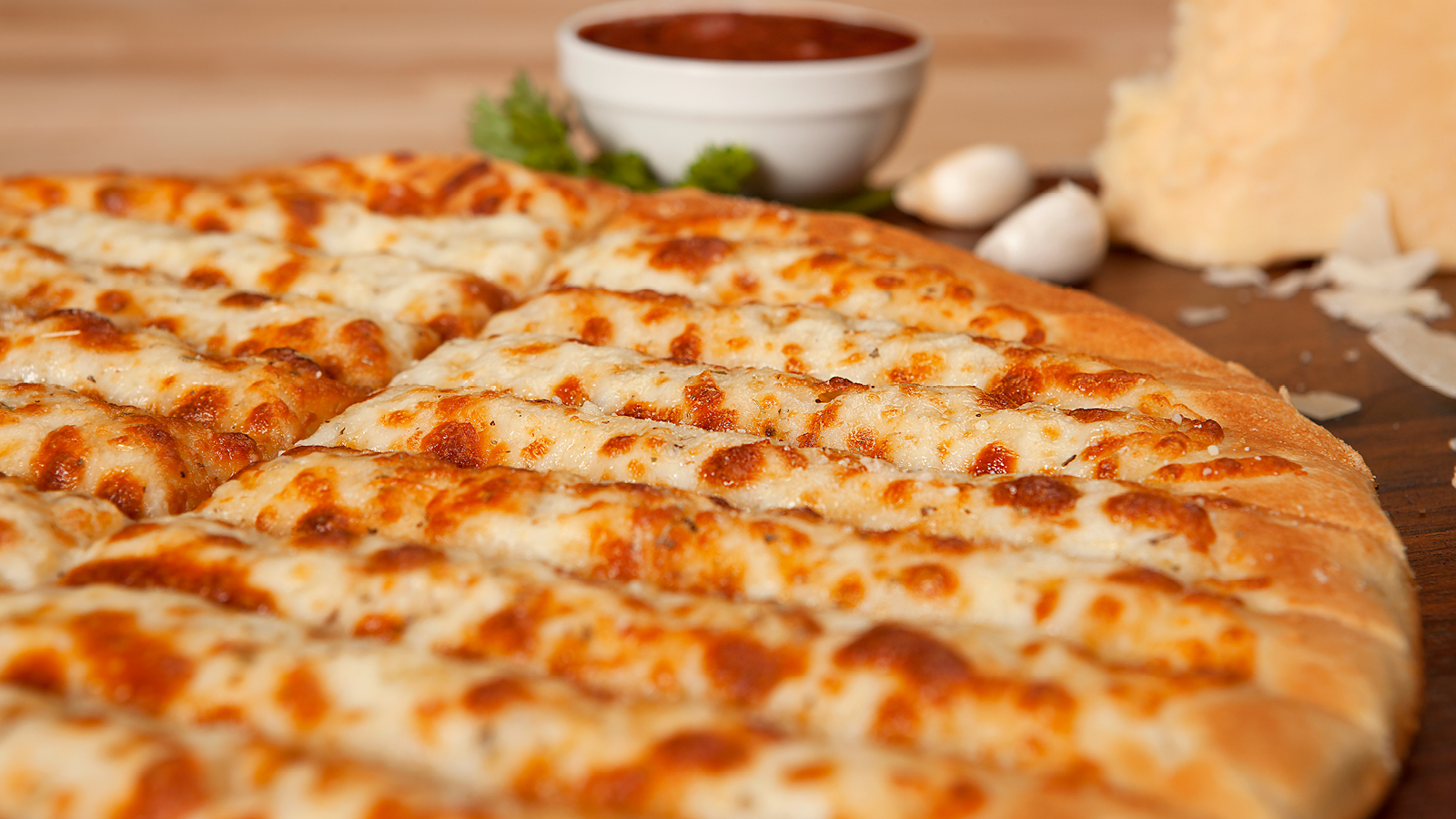 Order Cheesesticks food online from Godfathers Pizza store, Cedar Rapids on bringmethat.com