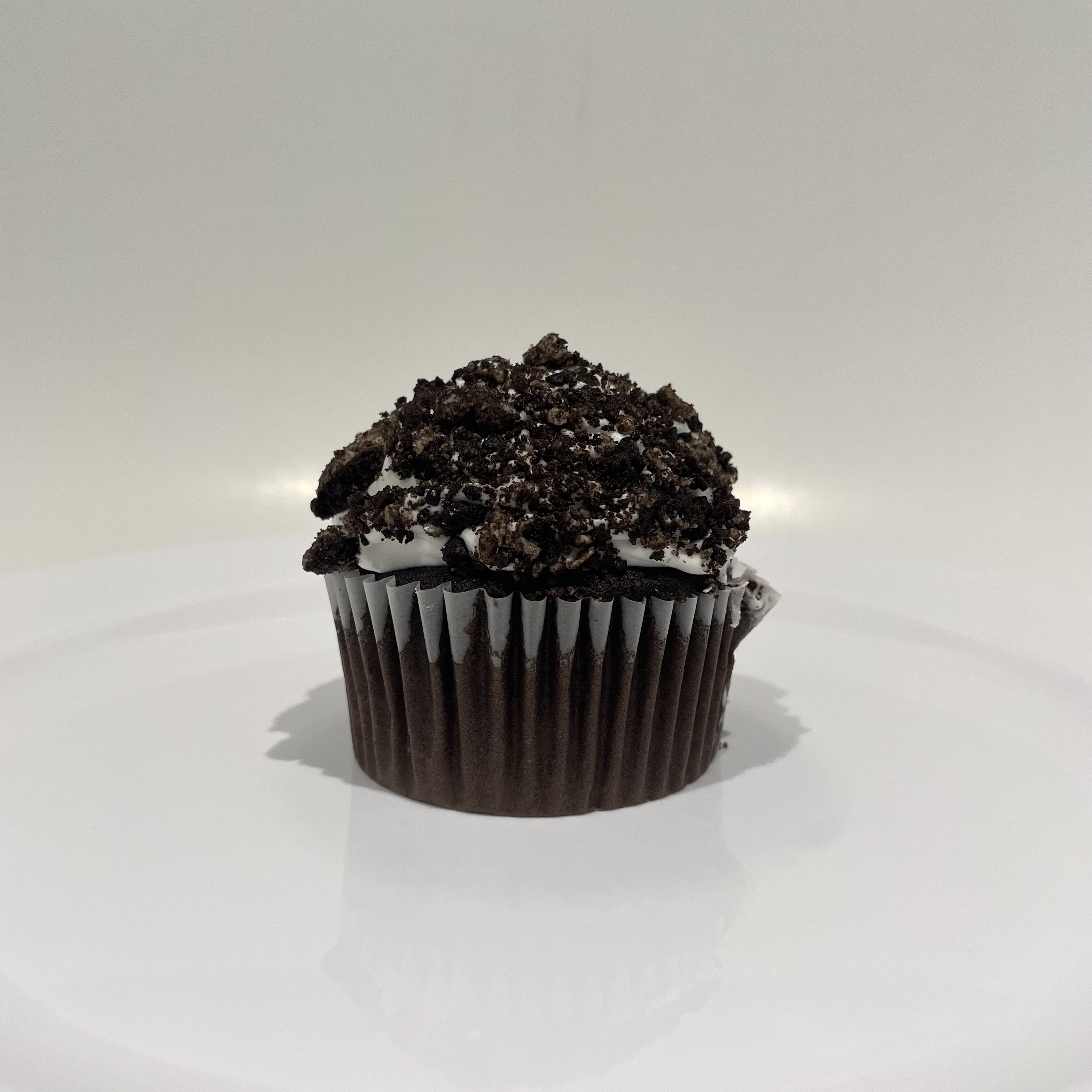 Order Cookies and Cream Cupcake food online from The House of Cupcakes store, Princeton on bringmethat.com