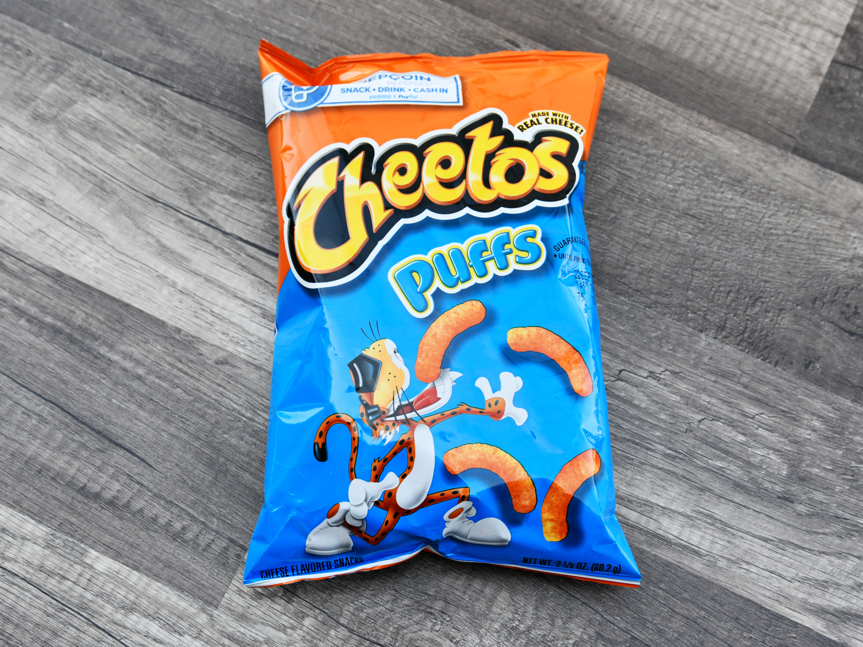 Order 21/8 oz. Cheetos Puffs  food online from Iris Shop store, Los Angeles on bringmethat.com