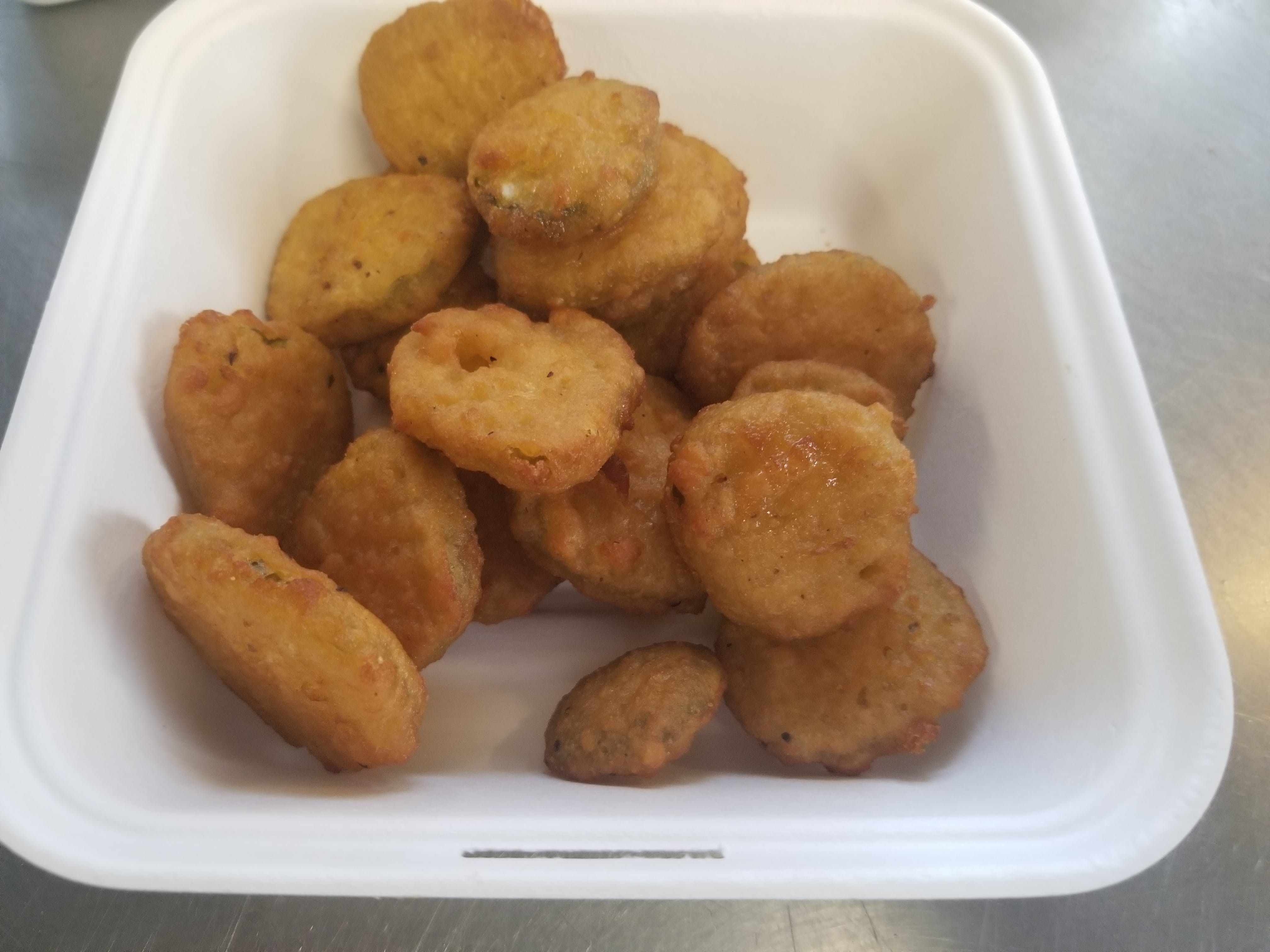 Order Fried Pickles - Side food online from Novotny's Groceries & Pizza store, Worthington on bringmethat.com